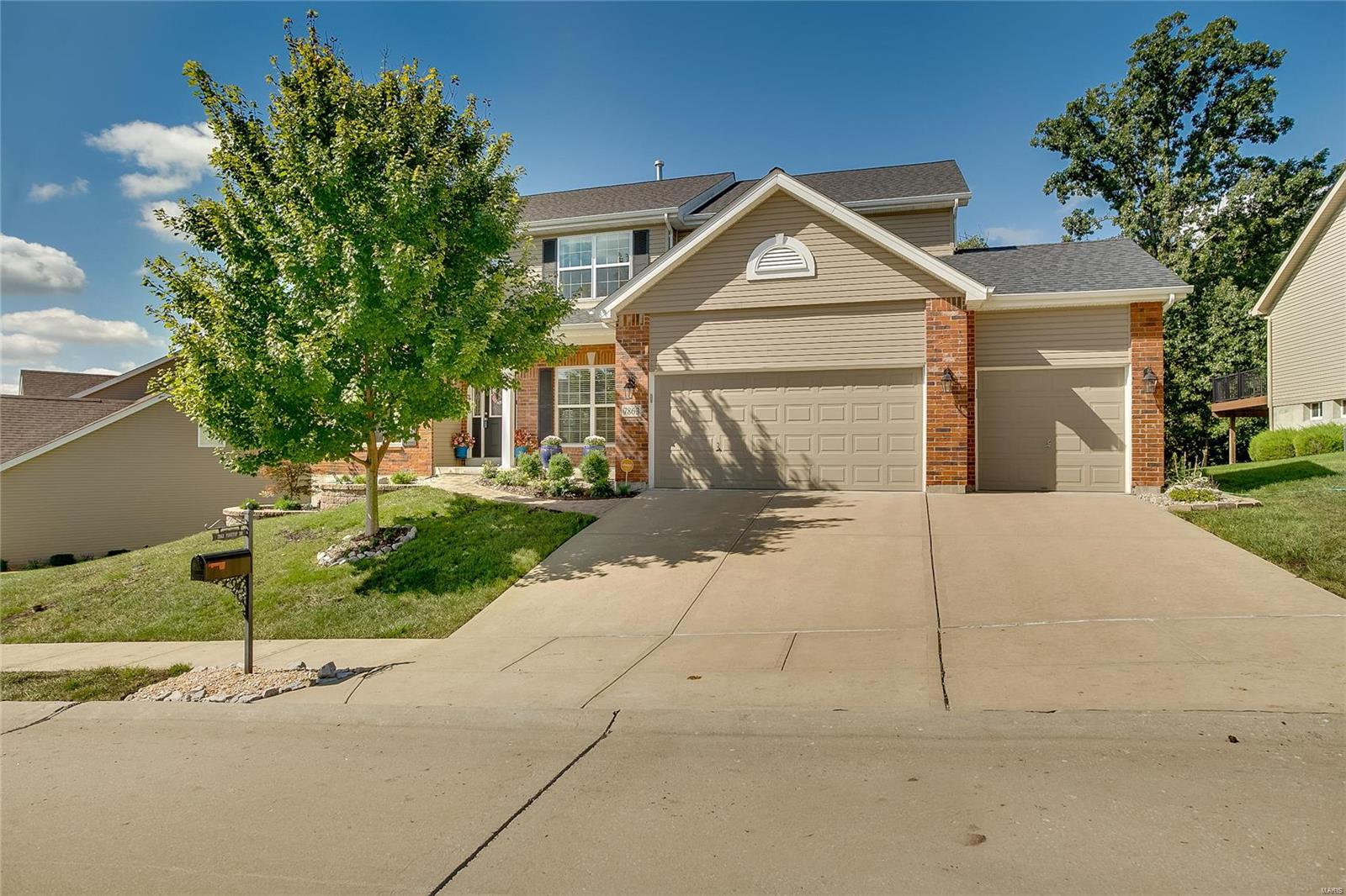Remarkable two story home in the beautiful Kingsridge Estates neighborhood of South County. This home offers 4 beds, 2.5 baths and over 3100 SF of living space. 9' ceilings soar over the entire main level. The family room is lined with a huge bay window, allowing in an abundance of natural light, and is open to the breakfast room and kitchen.  The kitchen has 42" upper cabinets, stainless appliances, and a center island. Heading back towards the dining room you come to the butlers pantry, which offers additional cabinetry and storage space. Upstairs you will find three spacious bedrooms, a full bath and the enormous master suite.  This suite has two walk-in closets (one of which is 19' long), a siting area and a full bath.  The master bath has a glass enclosed shower, separate tub and a double vanity. The lookout basement has a 9' tall foundation, is roughed in for a bath and is ready for your finishing touches, should you decide you need more living space. Take a look.Beautiful Home!