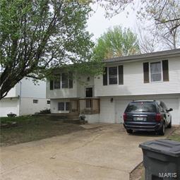 Welcome to this well maintained and updated 3 bedroom 2 bath home with 2 car garage. Finished LL Totaling 1624 Square Feet of Living Space. Centrally located within 1 mile of Gravois Bluffs and Hwy 141/Hwy 30. Very Close to I-270 as well. Great Curb Appeal with Mature Trees, near the end of a Cul-de-sac. Mostly Maintenance Free Vinyl in a Great Area!  Neutral Colors with Upgrades that make this house ready for its new family. New Roof (2012), New Deck (2015),   New Carpet throughout (2015), Heater & AC upgraded (2007), New Water Heater (2017). Other Features include Electric Flat Top Stove, Breakfast bar, Attic Fan, Six-Panel Wood Stained Doors. Large Finished Lower level provides additional space. Full Bathroom in Lower Level with Tile Floor & Shower Surround.  Outside you find a new 12'X10' Deck off Dining Area and Fenced Back Yard with large trees beyond the fence line. Located in George Guffey Elementary boundaries in the Fox School District. Come and take a look before it’s gone.