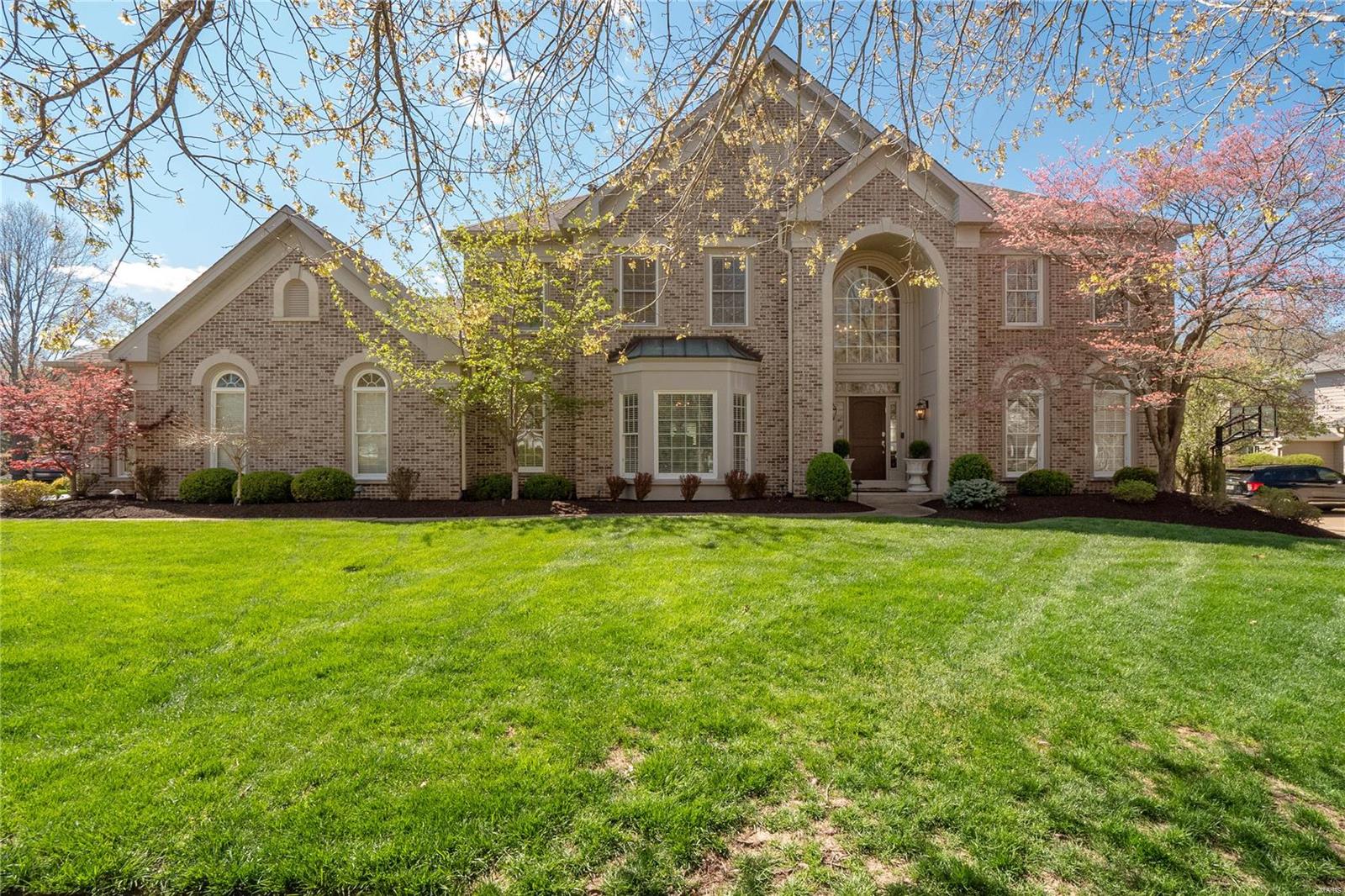 This spectacular 2 story home has been professionally renovated from top to bottom w/ beautiful high-end finishes. Professionally landscaped, situated on a level lot w/ a new private inground saltwater pool & hot tub, along w/ the brick elevation adds tons of curb appeal. Enter to find the formal dining rm & a family rm. The spacious great rm offers built-ins, a gas fireplace & a walk-behind wet bar. The stunning kitchen features custom cabinets w/ crown molding, quartz countertiops, center island, gas range, stainless steel appliances & an adjoining breakfast rm w/ a bay window. Upstairs you will find the master suite w/ a full luxury bath with double vanities, large tub, walk-in shower, heated floors & walk-in closet. 3 addtl bedrms all w/ a private full bath, complete the UL. The finished LL boasts a large rec rm & family rm, office, exercise rm & a full bath. Addtl features include 9 ft ceilings, large paver patio w/ built-in firepit, newer HVAC systems, 3 car garage & more!