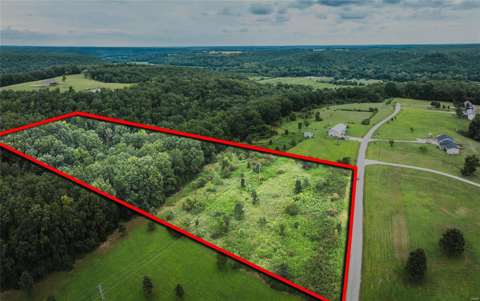 Discover your dream property with this beautiful 5.31-acre lot nestled in an established community. Located just a stone's throw away from the scenic Gasconade River, this rural retreat offers the perfect blend of tranquility and convenience. Enjoy the peacefulness of country living while being only minutes from town, where you can access all the amenities you need. The property comes with the added benefits of a shared well and electricity readily available, making it an ideal spot to build your forever home or weekend getaway. Don't miss this unique opportunity to own a slice of paradise!