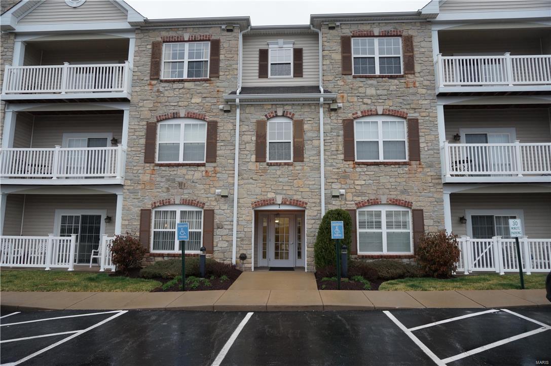 Gorgeous upscale corner unit.  Formerly a spec, condo  features entry foyer, open floor plan that leads into a great room with arched doorways,pleanty of natural light, 9 foot ceilings, 6 panel doors.  Gourmet kitchen with stainless appliances, pantry. Breakfast rooms leads outside to a covered balcony. Spacious master bedroom with full bath, walk in  closets. Private laundry room in unit.  One carport space and storage locker included. Secure building entrance with lobby, elevator access, intercom system. 
Plenty of additional parking available. Great location, walking distance to park, chesterfield aquatic center and Chesterfield mall.
Cannot be purchased as investment property and leased out. Location: Corner Location, End Unit, Upper Level