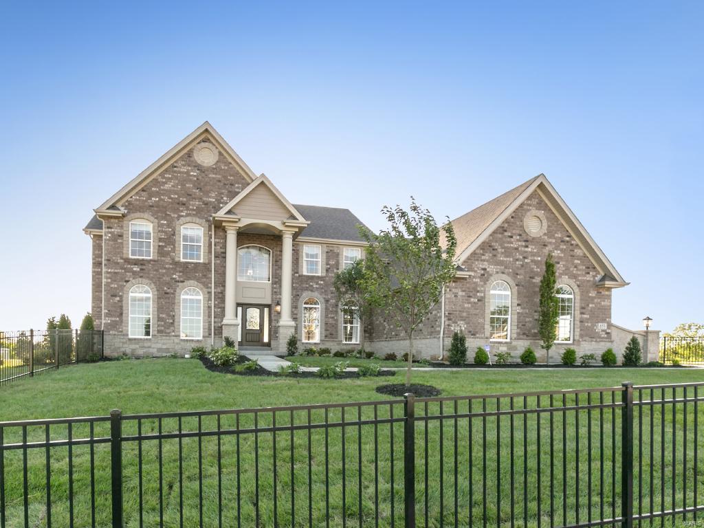 Beautiful and Stately 1.5 story Display Home in the highly desired Brighton Heights community. Two Story Great Room with 42" Gas Fireplace, Vaulted Hearth Room w/ Stone Floor to Ceiling Gas Fireplace, Extended Upstairs Bonus Room w/ Open Romeo Balcony and Coffered Ceiling, Antique White Stacked Kitchen Cabinets w/ Top Glass Front, Stainless Steel GE Kitchen Appliances with Gas Range with Hood, Refrigerator and Double Microwave/Oven Wall Unit, Granite Kitchen Countertops and Tile Kitchen Backsplash, Soft Close Drawers Throughout Home, 36" See Through Gas Fireplace in Master Suite/Master Bath, Free Standing Tub in Master Bath, 24x16 Composite Deck with Vinyl Railing, Framed Mirrors in Bathrooms, Flared Foyer Stairs w/ Iron Balusters and Exposed Treads, Jack and Jill Bathroom Upstairs, White Two Panel Doors w/ Venetian Bronze Hardware, Various Recessed Can Lighting Throughout Home, Separate Laundry Room with Cabinets and Window, 9Ft Ceilings on First Floor, 30 Year Architectural Shingles