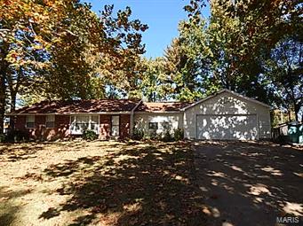 A Great Find! This is no little house on the prairie!!!   Large Lot, great home with 3  nice bedrooms, 2 bathrooms and workable kitchen.  Double Car Garage, Full Unfinished basement, Fireplace, and even a out building that could be an office or your get away.  HOME SOLD AS IS WHERE IS. SpecialListingConditions: Foreclosure