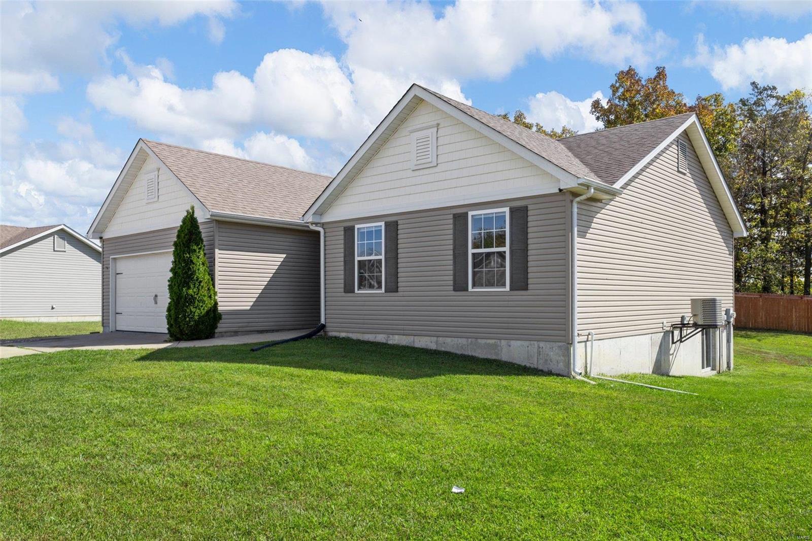 Welcome to this charming ranch-style home w/ a private backyard. Featuring 3 BR, 2 BA, & a 2-car garage, this residence is a perfect fit for your family. Inside, you'll discover luxury vinyl flooring in the great room, foyer, hall, & hall bath, creating a stylish and low-maintenance living space.  Having main floor laundry is a game-changer, making chores so much easier and more convenient.  The open floor plan offers a spacious feel & allows for easy entertaining. Additionally, the basement provides a fantastic opportunity for you to put your personal touch on it – the owner has given you a drywall start.  This family-friendly neighborhood is known for it's vibrant community w/ numerous children in the subdivision.  It's the perfect place to create lasting memories. Make this house your home today!