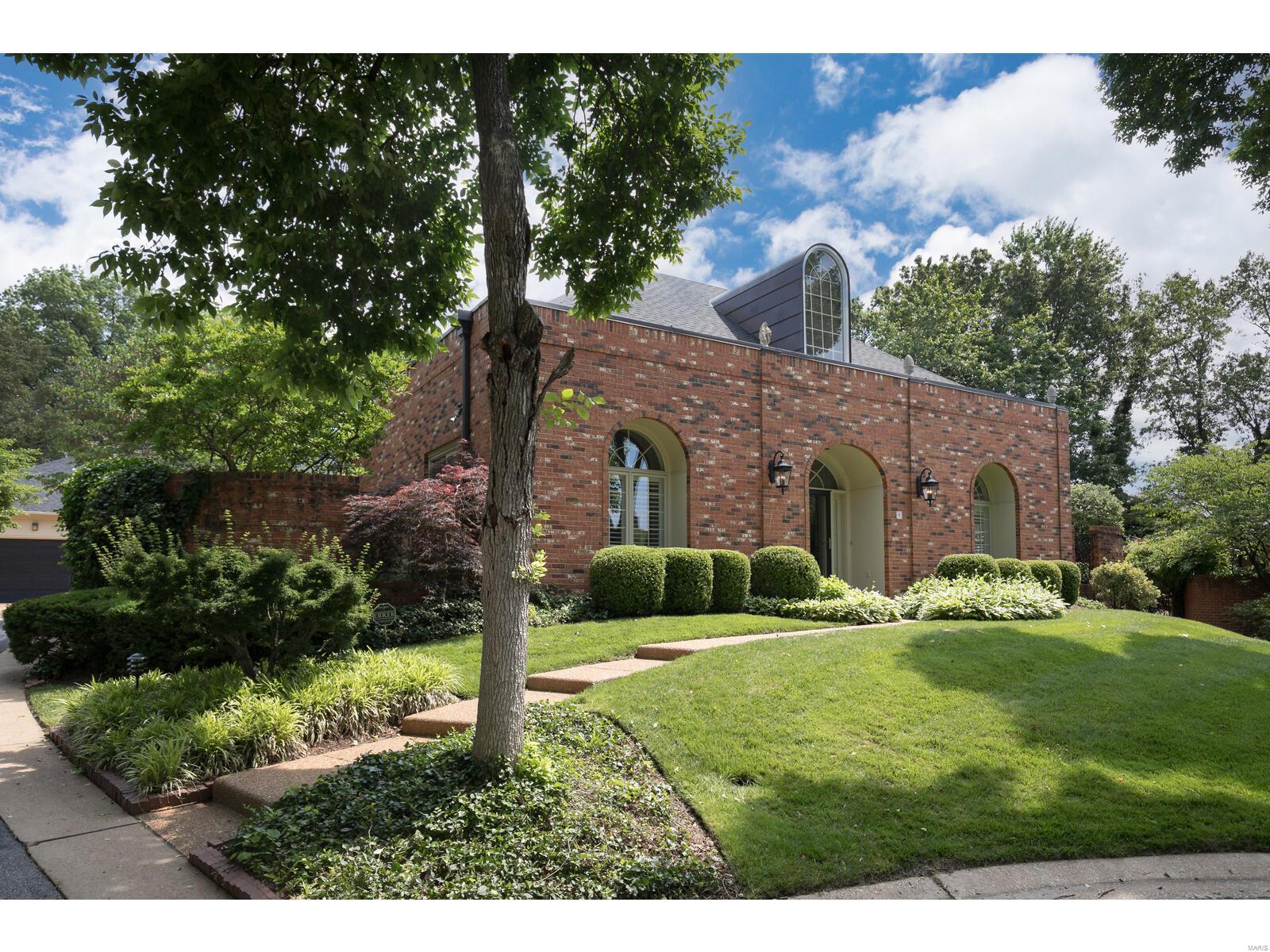 Prepare to fall in love! Stylish & sophisticated one story feels like a private vacation retreat with charming brick-walled terraces and wrought iron gates, and very private pool. Updated kitchen w/custom cabinetry, granite counters, bev cooler, farm sink, & breakfast bar opens to sitting rm w/wall mounted flat screen TV.  Separate DR, gracious LR w/wet bar and gas fireplace. LR, DR, kitchen sitting room & master BR all open via sliding doors to a central open air atrium w/charming pergola. Master suite w/2 walk-in closets & new master bath w fabulous shower. 2nd BR suite has private terrace. 3rd BR could be used as office/den. Each BR has full bath and private patio area. Door in master BR goes out to Baker pool & pergola with outdoor TV hookup. Lg laundry rm features granite counters & pull down steps to ample floored attic storage. Professional landscaping, stone retaining wall & fencing. 10 ft ceilings, pretty moldings, plantation shutters. Welcome to your personal oasis!