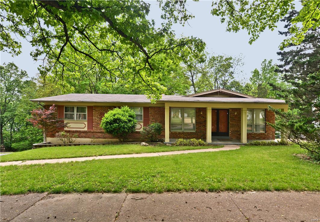 THIS 4 BEDROOM, 3 BATH RANCH IS CONVENIENTLY LOCATED CLOSE TO HIGHWAYS AND SHOPPING. PARKWAY WEST SCHOOL DISTRICT. IT HAS A REAR ENTRY 2-CAR GARAGE. THE MAIN FLOOR OFFERS FORMAL LIVING AND DINING ROOMS. THE FAMILY ROOM IS COMPLETE WITH A FIREPLACE AND SLIDING DOOR LEADING TO THE LARGE DECK OVERLOOKING THE PARK-LIKE BACKYARD. THE UPDATED KITCHEN OFFERS LOTS OF CABINETS AND COUNTER TOP SPACE. ALL 4 BEDROOMS ARE LOCATED ON THE MAIN FLOOR. THE MASTER BEDROOM HAS AN UPDATED MASTER BATH. THE WALKOUT FINISHED LOWER LEVEL HAS A REC ROOM WITH A SLIDING DOOR LEADING TO PATIO, A 5TH BEDROOM/OFFICE, AND A HALF BATH. CARPET IS BEING REPLACE ON MAIN LEVEL.