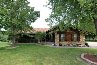 Beautiful home,park like setting!Entertainers will love the backyard complete with inviting pool,large patio,beautiful landscaping,composite deck,private 1.51 acre yard backs to woods w/lake view.This AMAZING outdoor area is hard to find.Inside, this ranch offers an open floor plan,vaulted family rm, wood burning fireplace,2 skylights,eat in kitchen w/silestone counters & bay window.MF utility/mud room with side entry.Bright master features w/in closet,separate shower/garden tub & dbl sinks.2 more bedrooms & a full bath on main level.Finished LL includes family room,bedroom,office,entertaining or change room with pool access,full bath,bar area as well as a double walk out to the patio & pool.Updates:'05-retaining wall,fence,composite deck, garage door replaced,'08-French doors replaced,driveway replaced, HVAC '10-concrete around pool replaced,'11-Anderson windows throughout,'12-pool concrete resurfaced.Do not let this one go!Desirable location near Page Extension. Additional Rooms: Mud Room