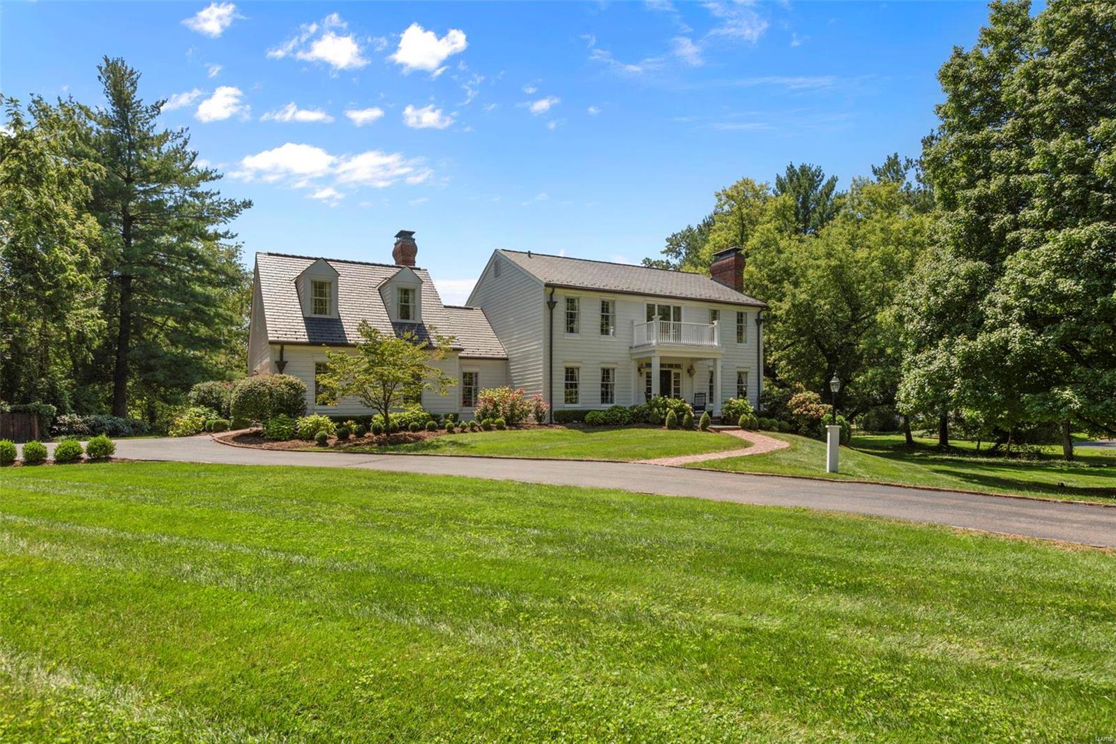 Welcome to this beautiful, Southern inspired estate. An impressive two story entry welcomes you with a stunning staircase. A formal living room is on your right and a charming office to your left. The living room has a woodburning fireplace & leads into the dining room, both rooms offering coffered ceilings. The kitchen is well appointed in the rear of the home & opens to a spacious family room. The kitchen offers high end appliances, custom cabinets, 2 sinks, a coffee bar & beverage fridge. The family room is charming with a beam ceiling & plenty of room to cozy up or entertain. Off the kitchen is a sunroom that looks over the expansive lot. The rear yard offers a deck, tennis court and amazing raised bed gardens. The 2nd floor has a primary suite with a spacious bath & walk-in closet. The other 3 bedrooms have custom closets & share a hall bath. A guest suite is the 5th bedroom, stairs are off the family room, a fantastic spot for company. The lower level has a finished play space. Additional Rooms: Mud Room, Sun Room