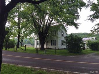 Don't miss this opportunity to develop the next new home development or keep it for all your farm animals + equipment. 83.41+/- acres with approximately 2000 feet of road frontage along Saline Rd. Subdivisions on either end of the property with county utilities. Around 42 acres of flat pasture land, with about 41 acres of wooded property. Original 2-room farm house plus 2-story home and several out buildings on the property. Buildings have no value to this property.