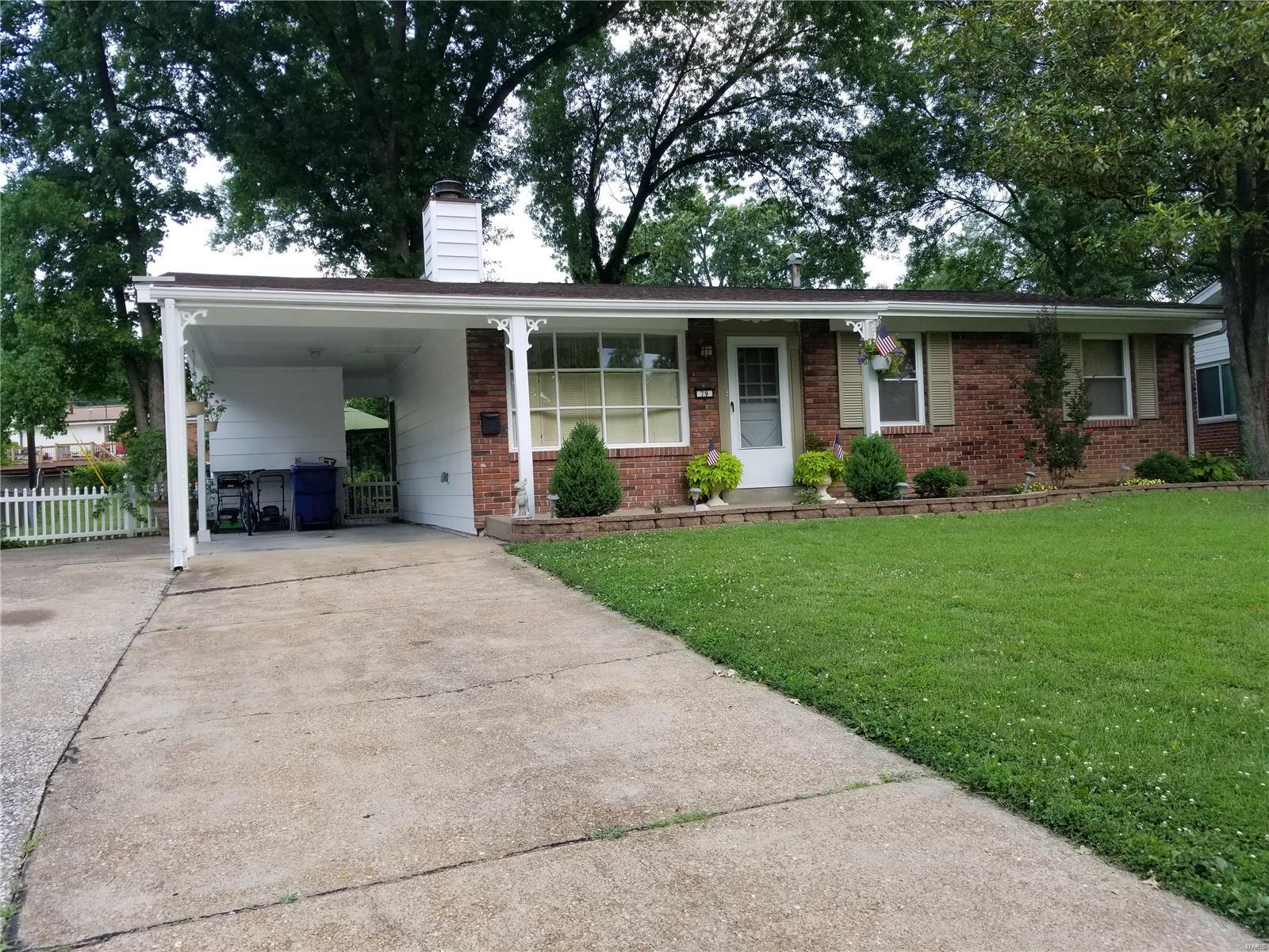 Ranch home with 3 sides Brick, nestled in a very convenient location. The kitchen looks like something straight out of a homes magazine & boasts beautiful granite counters, subway tile backsplash, updated faucet, large double stainless steel sink & tasteful vinyl "wood look" plank flooring. The living room features a wood burning fireplace, and plantation shutters. Hardwood floors flow from living room, down the hall and into bedrooms.  Ceiling fans in kitchen & 2 bedrooms. Six panel doors, newer roof, updated electrical panel. Large patio with awesome landscaping--perfect place for your morning coffee or to unwind after a rough day. Unfinished basement with laundry sink. Home protection plan to buyer. Bedroom #3 currently utilized as Dining Room. Seller is willing to convert back to 3rd bedroom prior to closing. Lower level refrigerator works and is staying. Close to several parks & "The Pavilion at Lemay" (rec center & outdoor pool).