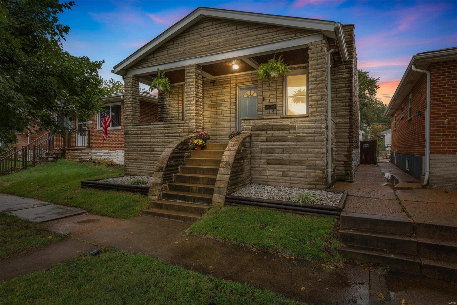 Back on the market after the holidays! Welcome to this charming 2-bedroom, 1-bath home located in the heart of the Bevo Mill area! The covered front porch welcomes you home. The home features wood veneer flooring throughout, a cozy eat-in kitchen, and the convenience of main floor laundry, this home is perfect for easy living. The main bedroom boasts an eye-catching exposed brick wall, adding a touch of character and warmth. Enjoy additional space with a walk-up basement, great for storage. Outside, you'll find a covered patio, detached 1-car garage and a fully wood-fenced backyard, ideal for privacy and outdoor gatherings. All appliances, including refrigerator, washer and dryer stay. Newer HVAC and roof. Don’t miss this opportunity in a vibrant neighborhood! Seller prefers an **as-is** sale due to timing of move.