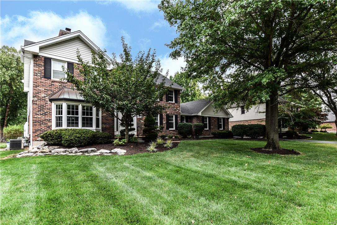 Beautiful 2 Story in Green Trails area.  Manicured yard w/ in ground pool & 3 season room. Newer insulated doors & windows.  Newer Roof.  Walking up to the home you are greeted by a lovely leaded glass door w/ dec. side lights.  2 Sty entry w/ ceramic tile floor.  Entry is flanked by LR w/ Bay window, hrdwd flr, crown & see thru gas log frplce to fam. rm.  DR w/ crown & hrdwd floor.  FR features crown molding, walk behind dry bar, frplce & door inside bay to patio.  Updated guest half bath w/decor. tile & newer vanity. Lovely kit/bkfst rm w/newer oil rubbed bronze fixtures, ceramic tile flr, planning desk, newer dishwasher, double ovens & down draft electric cook top in center island.  Mn flr laundry w/sink & washer/dryer hookups.  Exit the door from the brkfst rm to 3 seasons rm.  Dynamite pool fenced in from yard.  2nd flr features mbr suite w/crown, walk in closet, mbr bath w/2 bowl vanity, sep tub & shwr. Updated hall bath & 3 more beds. Rec Rm fin. in ll!  Wonderful package!