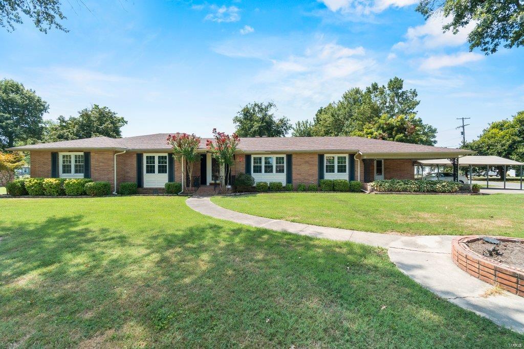 Make this one a must-see! A rare find, 2800 sq ft ranch on a corner lot in the center of Lilbourn. Home features two large living spaces with a bonus room in the basement. Home being sold as is.