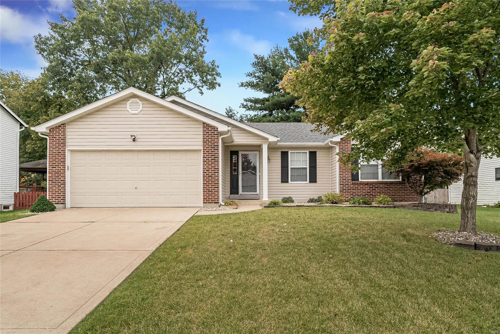 You'll feel right at home in this CHARMING well-maintained Ranch located in the sought after Cambridge Estates sub-division in Francis Howell Central schools. Open floor plan concept with many valuable updates!  Including HVAC,  new roof installed a month ago, 2"blinds, six-paneled doors, whole house baseboards, and trim change out. Stunning hardwood flooring graces the kitchen, breakfast room, living room, hallway, and foyer. Pristine hall bathroom remodel. The spacious master suite is worthy of its name! Check out the quality finishes in the master bath, with its dual sinks, generous size vanity, and 24" by 12" porcelain tile flooring. Enclosed soffits, updated gutters, and siding. Nicely landscaped with retaining wall and perennials. Close proximity to elementary school. Great highway access to make your commute a breeze in any direction. If you are looking for new systems and updates! This is a must-see.