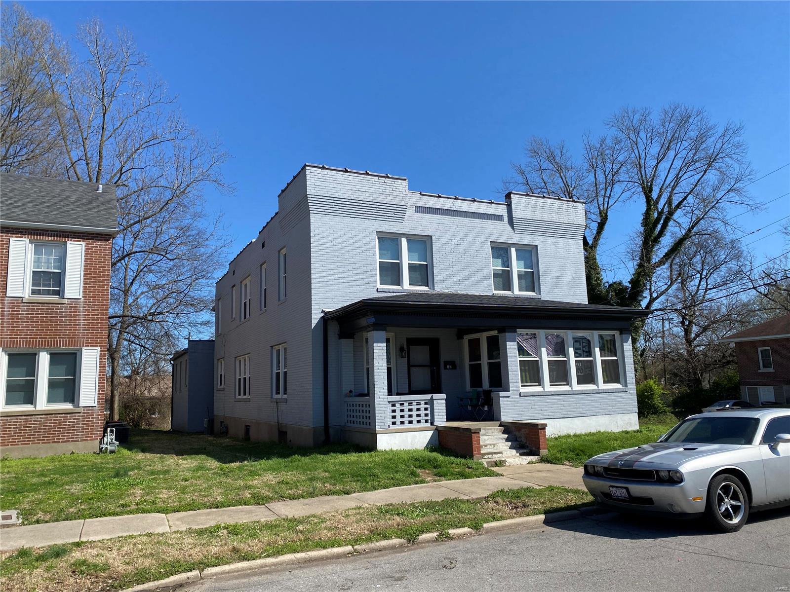 Great investment property located within walking distance of SEMO.  Great rental income.  The building has an address of 102 N. Henderson for the main level and rear accessory unit, with the two upper level units having an address of 1124 Themis Street.  Main level has a room count of 8/3/1.0 with 1,831 SF of GLA.  Rented for $975 per month.  1124A has a room count of 4/2/1 with 812 Sf of GLA.  Vacant.  1124B has a room count of 4/2/1 with 837 SF of GLA with rents of $550.  The rear unit has a room count of 3/2/1 with 497 SF of GLA with rents of $500.  This unit is over a detached garage with three overhead doors that is currently utilized as storage.  The building has been updated with new kitchen cabinets and counter tops, updated bathrooms, and some new wood laminate flooring.