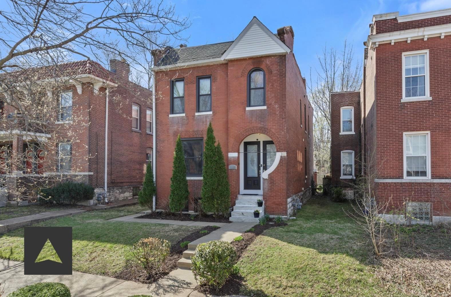 This stunning two-story Tower Grove home blends classic charm with architectural character, distinctively highlighted by a "Keyhole" front entry that is rare in STL. Inside, you'll find a thoughtfully designed layout with soaring ceilings, hardwood floors, a gas fireplace, and exposed brick. A well-appointed kitchen with stainless appliances, a center island, and quick access to the lovely backyard or main floor laundry room. The second floor boasts 3 spacious bedrooms, two flanked by a jack and jill bath and the primary suite offers a private retreat with a luxurious en-suite bath. The finished lower level provides additional living space for entertainment or a home office with a 3rd full bathroom. Step outside to enjoy the beautifully landscaped yard with a large deck for entertaining. Nestled in a prime location, just steps from the tree-lined paths of Tower Grove Park & the vibrant energy of Morganford’s shops, cafes, and restaurants make it a truly exceptional place to live.