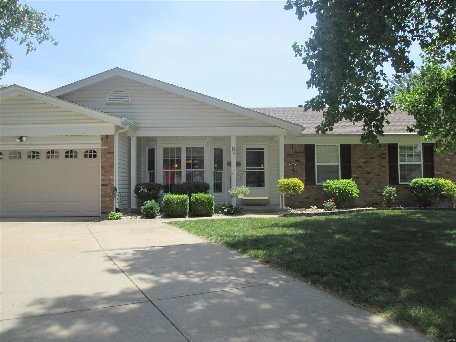 Hurry to this 3 br / 3 ba beauty in the Francis Howell school district.  With 1560 sq ft on the ground floor with about 625 sq ft more in the partially finished basement with a walk out and a full bathroom, your family will have plenty of room to spread out.  Eat-in kitchen with granite counter tops and stainless steel sink installed in 2018.  The 15 x15 master bedroom has a large bathroom and walk-in closet.  Secondary bedrooms have double closets.  Main floor laundry and oversize two-car garage.  Covered deck off the kitchen.  Well maintained with a number of seller updates, including: Roof-installed 2017; dishwasher and microwave-installed 2018; master bath and hall bath have both had the vanities, faucets, floors and toilets replaced.  A one-year home warranty is being provided by the seller.