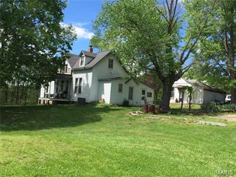 1903 FARMSTEAD With 8 Acres. Barn. Summer Kitchen. Detached Modern Garage. Old Chicken Coop. Stock Pond. SCENIC VIEW OVERLOOKING LOUTRE RIVER VALLEY FARM GROUND! Pasture for your Horses, Cattle. Nearby Historic Hermann. 4 Bedrooms. Seller never intended to move but Daughter & Grandchildrens encouragement is making this happen! There is a Flu in the Kitchen for Wood Stove. Additional Rooms: Mud Room