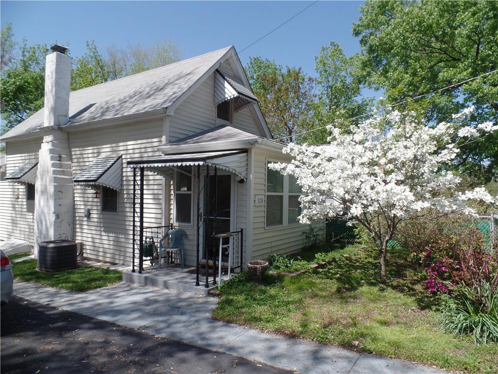 SELLING AGENT BONUS OF $1,000 AT CLOSING! What a Darling Picturesque, Charming and Beautiful 2 Story 2 Bed/1 Bath with Sunroom and Den with Full basement. Off street gated parking for 3 Cars. Bird watchers Dream Home with Eagles, Owls and migrating birds from near the river. White picket fence backyard with 6 foot privacy fence. Fencing goes all the way around the property. Small but Quaint, Cozy Cottage Attractively nestled in a Park like setting. Unusual Queen Anne Old-fashioned 1920's Style Home. Comes with W/D, Dish Washer, HVAC, Tilt in Windows, Stove and Fridge, Shed with lawn mower. On the grounds there are over 40 Rose of Sharon Trees, Very Nice Purple Lilac Bushes. Red, White and Blue Snowball Bushes, White Dogwood Tree, 3 Rose Gardens Areas and 1 Imperial Princess Tree with the most beautiful Light Purple Blossoms. Additional Rooms: Sun Room