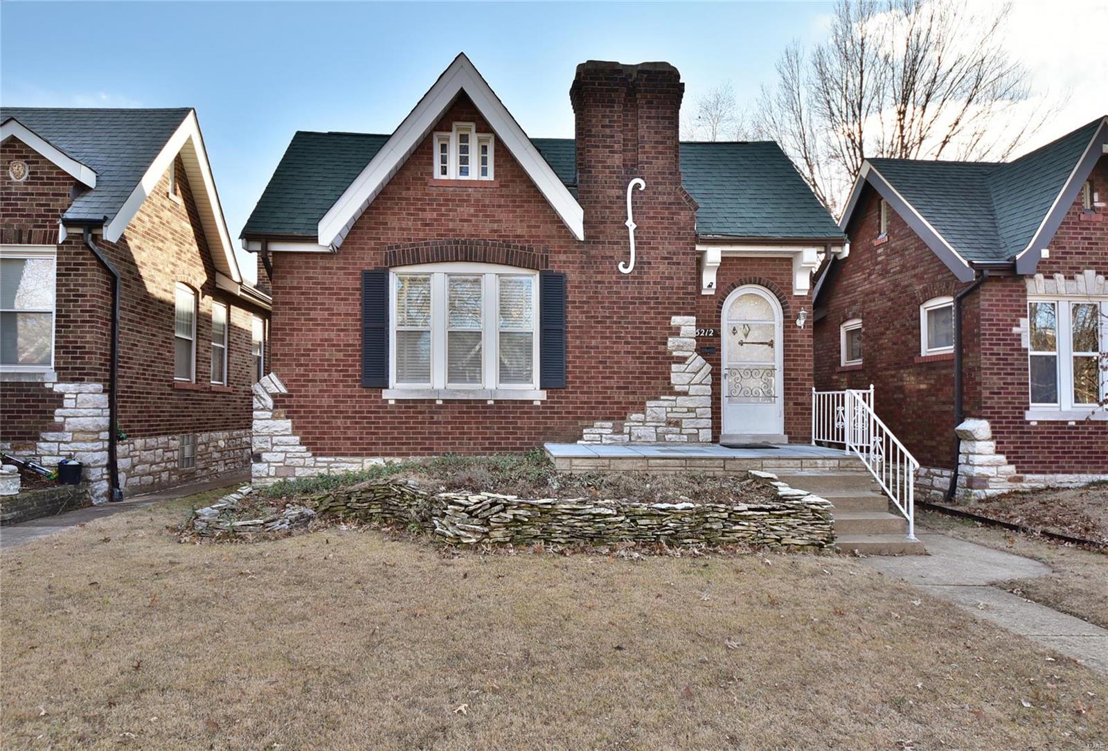 This charming 2 bedroom all-brick cottage boasts tremendous curb appeal offering a bright &open floorplan while maintaining the original character w/stained panel doors, trim& beautiful hardware . The entry foyer welcomes you home &flows naturally into the extra-large living room featuring a decorative brick fireplace &large windows. The adjacent dining room is ideal for hosting social gatherings w/family &friends. The chef in you will adore the inviting eat-in kitchen, glass-front cabinets, beautiful Vitrolite half-wall &backsplash +a convenient walk-out to the big 3-season sun room. Hidden character can be found in a drop-down ironing board &working transom window. The bedrooms are nice-sized, have handsome hardwood flooring &the master bedroom closet has stairs to the attic. The finished LL adds a huge family room, kitchenette &massive storage area w/built-in shelves.  Hardwoods under carpet in dining &living rm! Enjoy effortless parking with the rear-entry garage &covered parking! Additional Rooms: Sun Room