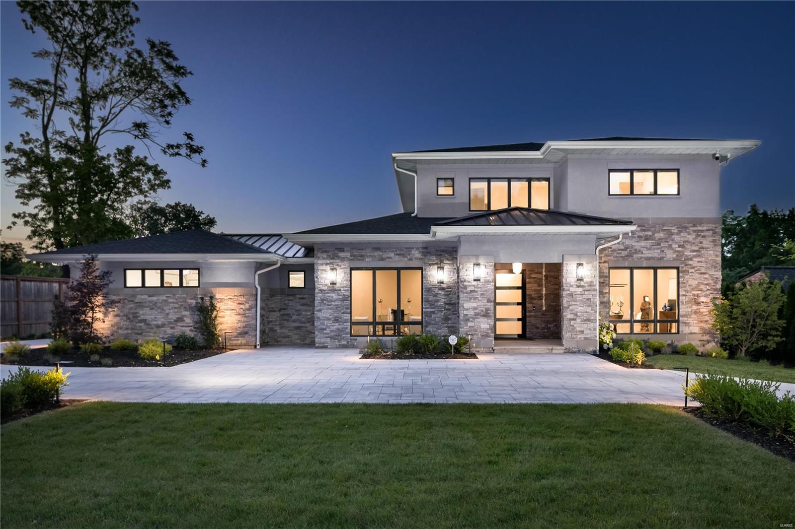 New construction ownership in the City of Ladue. Designed and built by a Think Tank and consortium of industry experts to surpass every standard; a stay-in-place home equipped for every walk or stage of life. Voice command full-home automation, powered sliding doors, elevator to all levels, touch command shades. 5 BR, 6 BA; over 6,000 SF Total living area including 1,700 SF finished lower level. Hallmarks include 10' ceilings, wide plank wood floors, Award-winning Primary bath selected by St.Louis Magazine, gourmet kitchen, Ceramic walled Living Room w/safety glass FP, organized closets and luxe outdoor space. 2nd level: 3 bedroom suites and reception. The backlit stairs are a unique aesthetic matching the functionality and practical design of every feature in the home. Finished expansive Lower level: kitchenette, 1/2 bath, full BR Suite, 2 unfinished storage areas. 3 car garage (w/room for 5) + additional storage space. Front circle drive. A true custom one-of-a-kind offering.