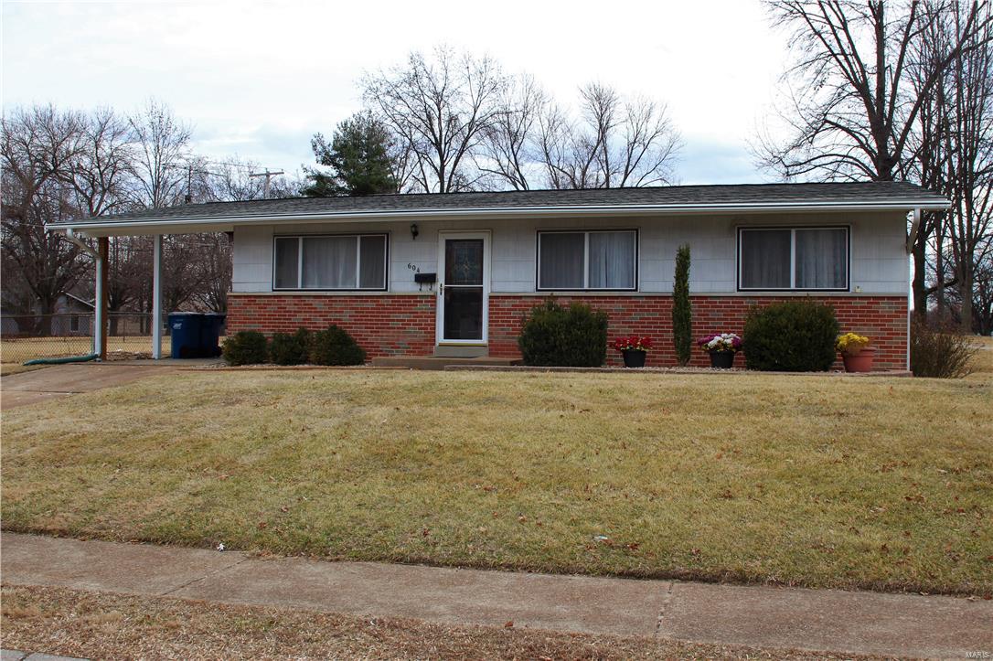 Charming ranch in a great location on a large corner lot! Front living room is full of light and features hardwood flooring that flows to the formal dining room and all three bedrooms. The master bedroom has a half bathroom and there is a full bathroom off of the hallway. The kitchen has plenty of cabinets, a stove and electric range. The basement has an abundance of storage space, laundry hookups and is awaiting your finishing touches. Large, level, fenced in yard and a covered carport with a partition and swing gate. This lovely ranch will not last long, schedule a showing right away!
