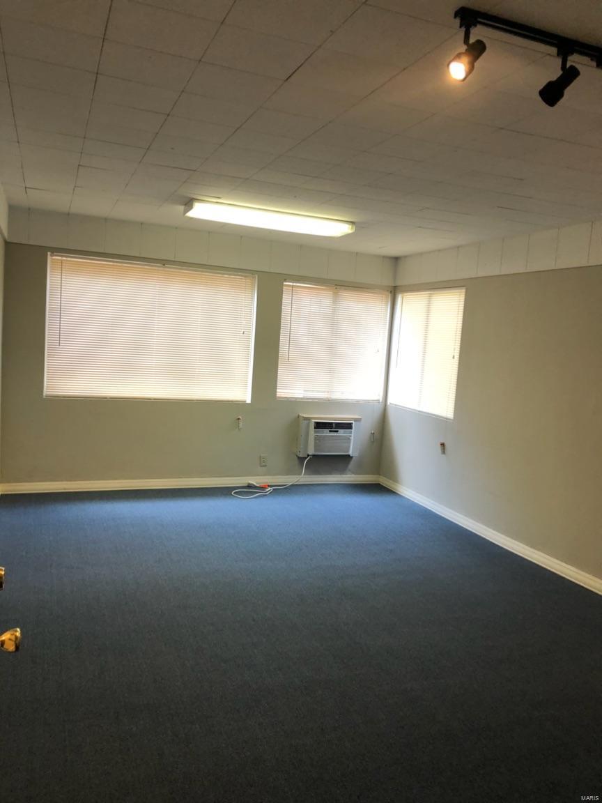 Here is your unique chance to lease an office studio in Clayton for only $400 per month.  This office is on the second floor with other five units above the small retail center at the entrance of Davis Place subdivision. Please call Listing Agent for more information. Location: Corner Location