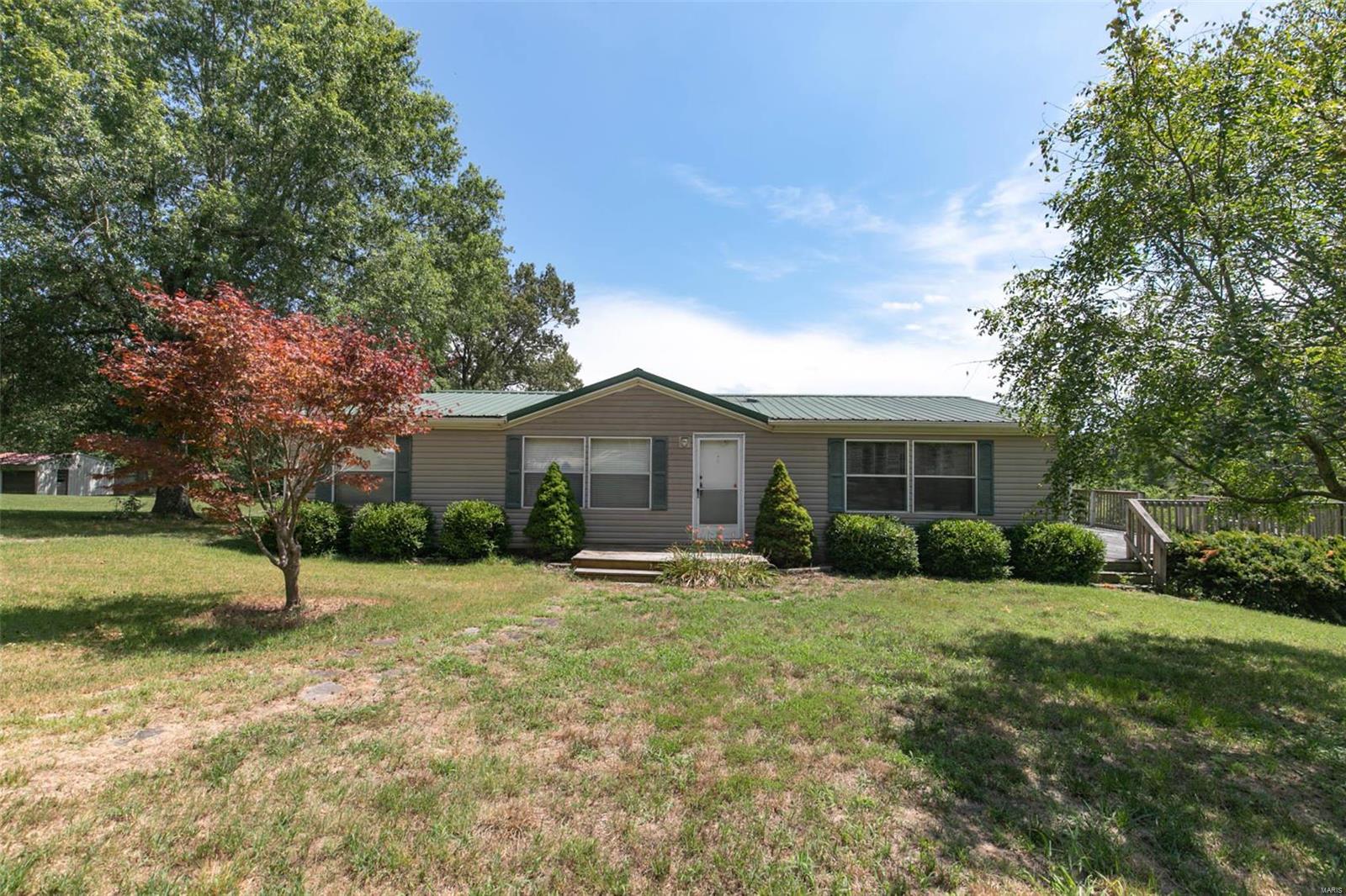 $89,900. 242 CR 476 PB. Well maintained 3bd/2ba modular home siting on 5 acres close to town. Home is a 2001 Oak Knoll Fleetwood and is sitting on a solid concrete poured foundation. Kitchen has a center island with sink and dishwasher. Master bedroom has a walk-in closet & master bath with garden tub and dual sinks. This property also offers a large open deck great for entertaining! 
 Property has 5 acres, made up of a combination of yard, pasture and woods. Back of property is fenced and held livestock at one time.  Nice and clean and ready to move in to...check it out for yourself!!