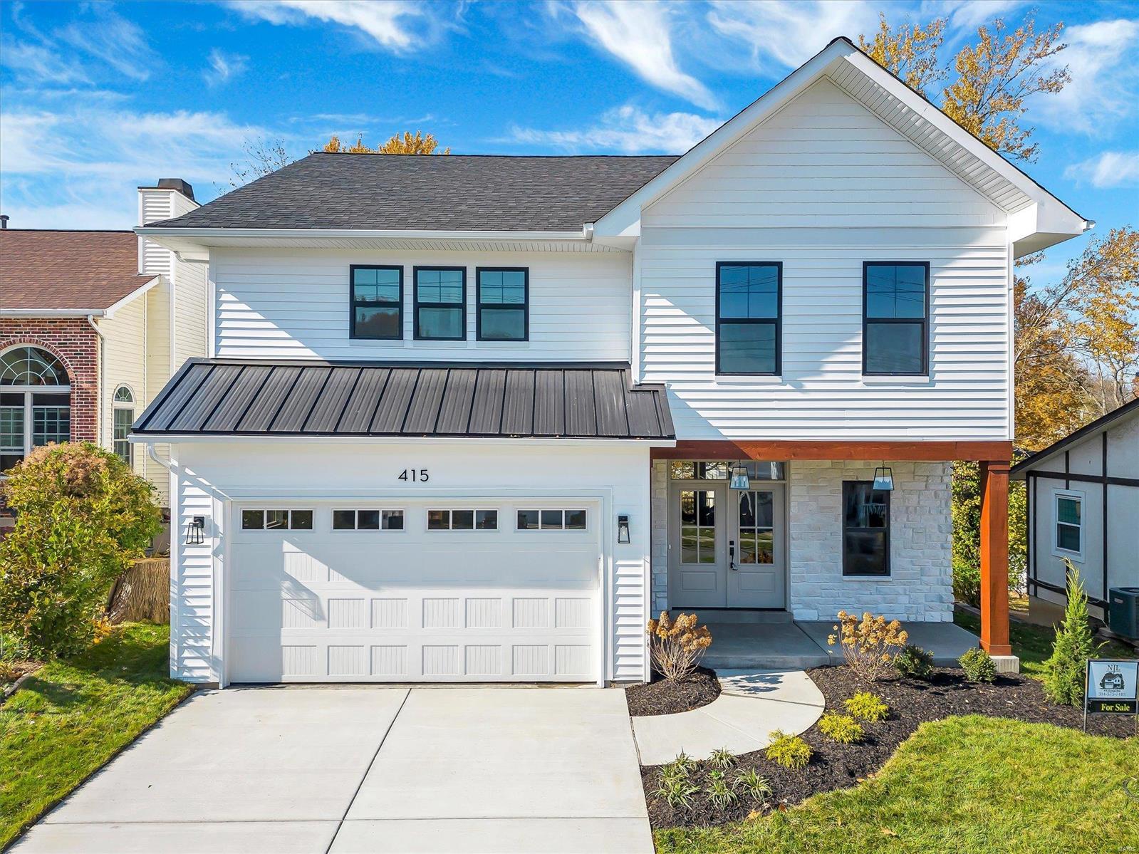 Welcome to this beautiful NJL custom home! Experience the epitome of luxury living in this 5 bed, 5 bath new build. Step inside, and be greeted by gorgeous floors throughout, creating a seamless flow in the open-concept design. Large windows grace every room, allowing natural light to illuminate your living spaces. The heart of the home is the stunning kitchen, equipped with plenty of cabinet and countertop space, complemented by a spacious island for culinary delights. A mudroom off the garage ensures a clutter-free entry, while the expansive laundry room adds to the convenience. The finished basement features a built-in dry bar, an additional bedroom and full bathroom that provides extra comfort. The grand primary bedroom offers a huge built-in vanity, making your morning routine a breeze. The primary bathroom is a spa-like oasis with double vanities, a soaking tub, and a stand-alone shower. This home embodies elegance, comfort, and functionality.