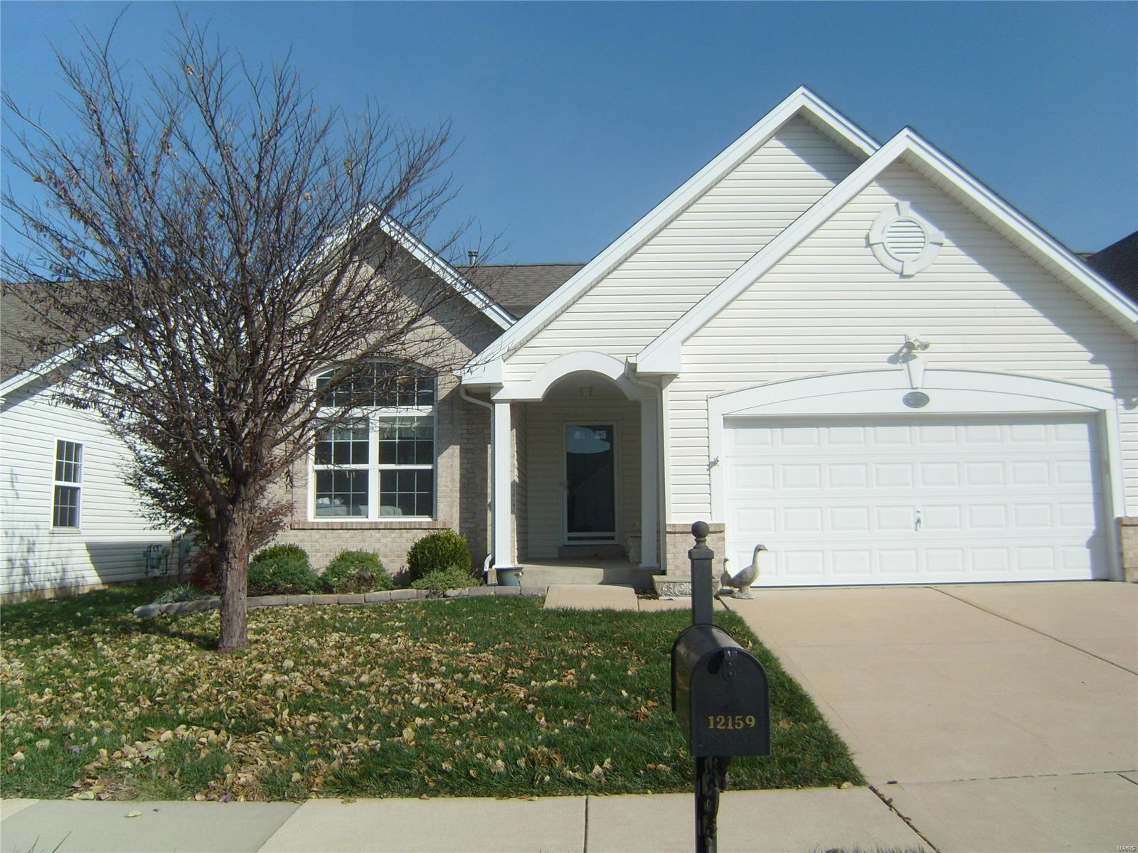 Will be back on in Feb.  Seller wants offer. Enjoy relaxed living in this friendly close-knit community of attractive 1 level villas. Newer 2 bedroom, 2 bath pristine villaspring. features brick front & 2 car over sized garage.  Lovely covered front porch leads to a dynamic entry foyer & stunning, vaulted great room including dining area.  Gather in front of gas fireplace with friends.  Just a few steps to the breakfast rm or out to the private patio. Spacious cook's kitchen accommodates all your cooking needs with generous cabinets, large pantry & is open to great room.  Don't miss those soft close drawers & pull outs.  Main flr laundry w/extra storage leads to spacious 2 car garage. Spacious master bedroom has great walk in closet & private bath featuring walk-in shower w/seat. 2nd bedroom is bathed in light for a comfortable guest room, office or reading room. LL has rough in for future bath & egress window allows bedroom. Lower condo fee includes lawn maint, trash, snow removal. Location: Lower Level, Other