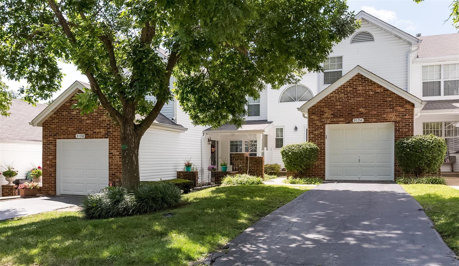 This 2 story townhome w/ over 1600 SQFT of living space PLUS an additional 300+ in finished LL has been tastefully modernized. Updated light fixtures, flooring, paint, & custom touches make this one EXTRA special. Kitchen features SS appliances, subway tile backsplash, custom cabinetry & granite counters. Dining area is begging for a dinner party & we’re sure everyone will “ooh-aah” over the custom wood plank accent wall! Living room is spacious & holds a gas fireplace to keep you warm if winter ever arrives in St. Louis. Upstairs holds 2 bedrooms, 2 full updated baths, including master suite w/ vaulted ceiling, built ins, walk in closet & don’t miss the sitting room behind the sliding barn door! Basement is finished & yes- it has a bar! Double deck w/ LL walk out to backyard. With Autumn Lakes gorgeous clubhouse, pool, tranquil ponds, tennis court & basketball courts- you’ll think we sent you to an all-inclusive resort- served w. an iced drink & pink umbrella. Cheers! Location: Ground Level