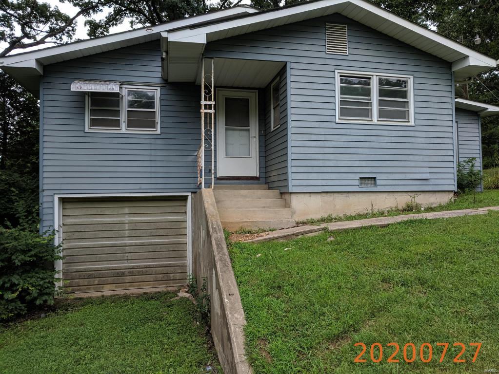 Adventure awaits -5 acres - lots of cleared space/ Ranch style bungalow with tuck under garage; some assembly required. ***Seller will not complete any repairs to the subject property, either lender or buyer requested. The property is sold in AS IS condition. Pre-Approval letter or Proof of Funds required. Sale addendum and earnest money as certified funds will be required for final acceptance. This property is eligible under the Freddie Mac First Look Initiative through 03/17/2019