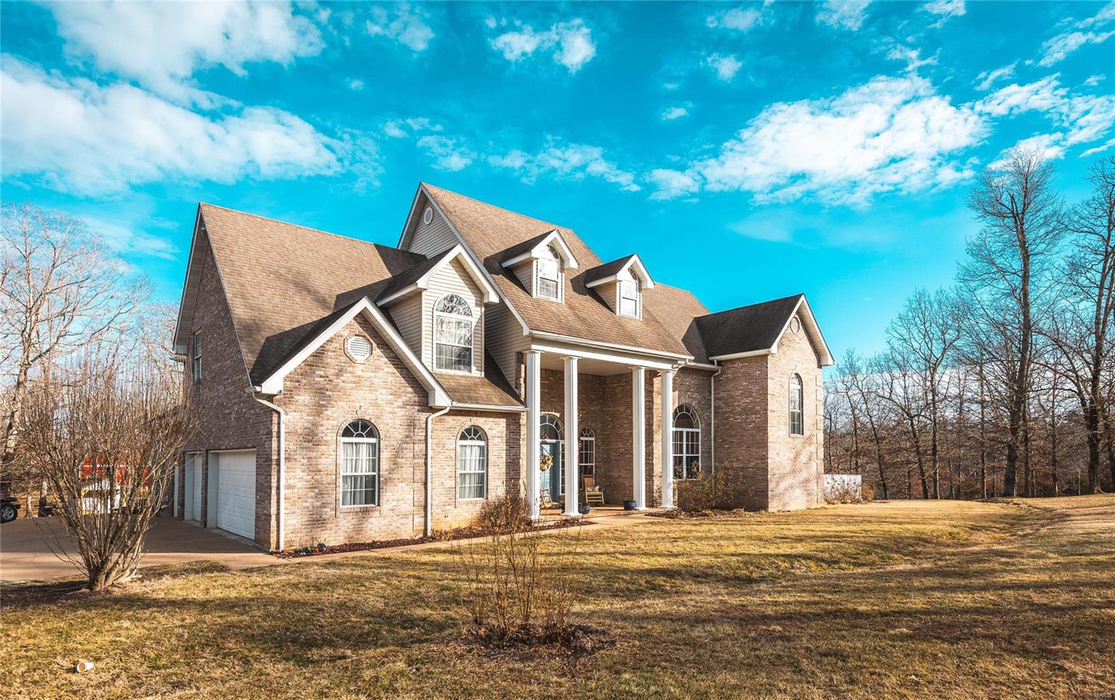 Country Estate - Listed at $719,995, just under the current appraised price. This country estate couples as a mini farm with 24 acres that borders the Mark Twain National Forest. The home has 5 bedrooms, 5 full baths with an additional 2 1/2 baths and a total of 17 rooms. The kitchen is very spacious with Italian Marble countertops, JennAir gas stove and oven with a large walk-in pantry. You gotta see the master bedroom and all the closets to believe it. The home is full brick veneer with an oversized 3 car garage and decks on the main and upper level. The property has a 30 x 40 barn that would be suitable for horses, goats, chickens and more. The western boundary of the property borders 11,518 acres of US Forest Land. Just a short 2-minute drive to the crystal clear Huzzah Creek, a ten-minute drive to a paved air strip and beautiful 9 hole golf course. This country estate is located just north of Viburnum, Missouri near the community of Dillard home to the Dillard Mill State Park.