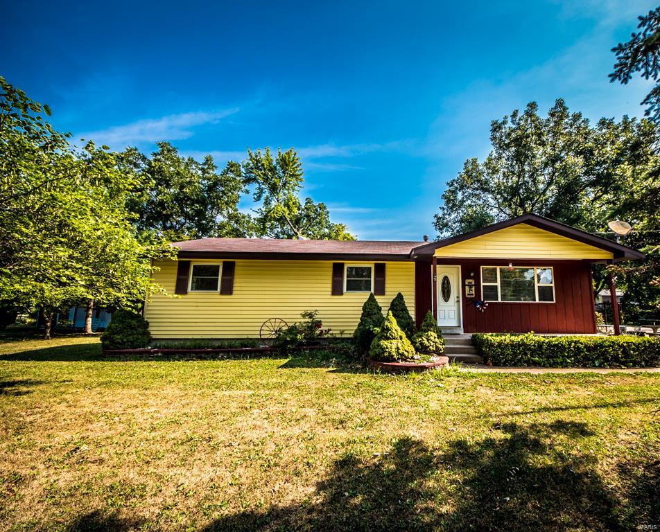 3 bedroom ranch on 1/2 acre corner lot in the quaint little town of Portage Des Sioux in the Orchard Farm School District.  Covered parking plus 2 storage sheds. Huge bathroom with separate shower and bathtub.Large eat in kitchen. Main floor laundry room. Full poured concrete basement .  Level lot with plenty of room for a garden.   Nice large shaded patio to spend time enjoying this peaceful location. Stroll down to the river, dock a boat close by, take advantage of the Portage Des Sioux Nature areas, fish when ever you want!  This home would serve well as a full time, or, a weekend leisure residence. Well maintained home by the original owner.