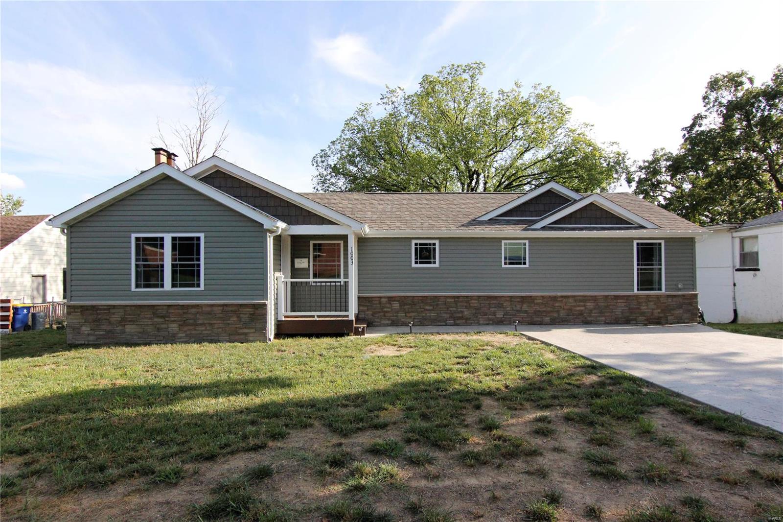 This 3 bedroom ranch with 2 baths is a rare find.  It was completely renovated down to the studs by the former owner.... Kitchen cabinets, newer stainless steel appliances, marble kitchen countertops including replacing the flooring throughout the house, the bathrooms flooring was replaced with new ceramic tile, showers, sinks, toilets, and vanities. The Master bedroom has a huge walk-in closet with organized shelving. The outside received new roof shingles, gutters, siding, composite front decking with a new front door. And behind the scenes: furnace, hot water heater, insulation, and I almost forgot to mention New windows. and a stamped concrete driveway large enough for 4 cars.... and stamped concrete patio in the back to sit and enjoy the big fenced in yard.  If you are looking to downsize and are searching for a home with a main floor laundry offering a miminal amount of steps to enter the home, your search could very well stop here.  You will not be disspointed in this home.