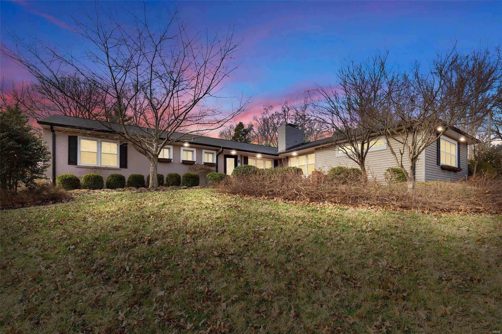 This quiet and spacious ranch home nestled just off Spoede in Creve Coeur is located in the LADUE School District (a short walk to Spoede Elementary). The front yard walking path and private brick terrace set the tone for the warmth and beauty that awaits just inside. Main floor hardwoods throughout - including the large master suite with contemporary bathroom, additional bedrooms, kitchen, dining and gathering places. The sleek white eat-in kitchen features stainless appliances, double sink & granite counters. Wood burning fireplaces in the main floor gathering and family rooms. Updated bathrooms. You'll love the mostly finished walk out lower level retreat - featuring a HUGE recreation space, three (3) bonus rooms, laundry room and storage room. Entertain outdoors on the large landscaped patio just off the kitchen and fully fenced in back yard. Attached 2-car garage.