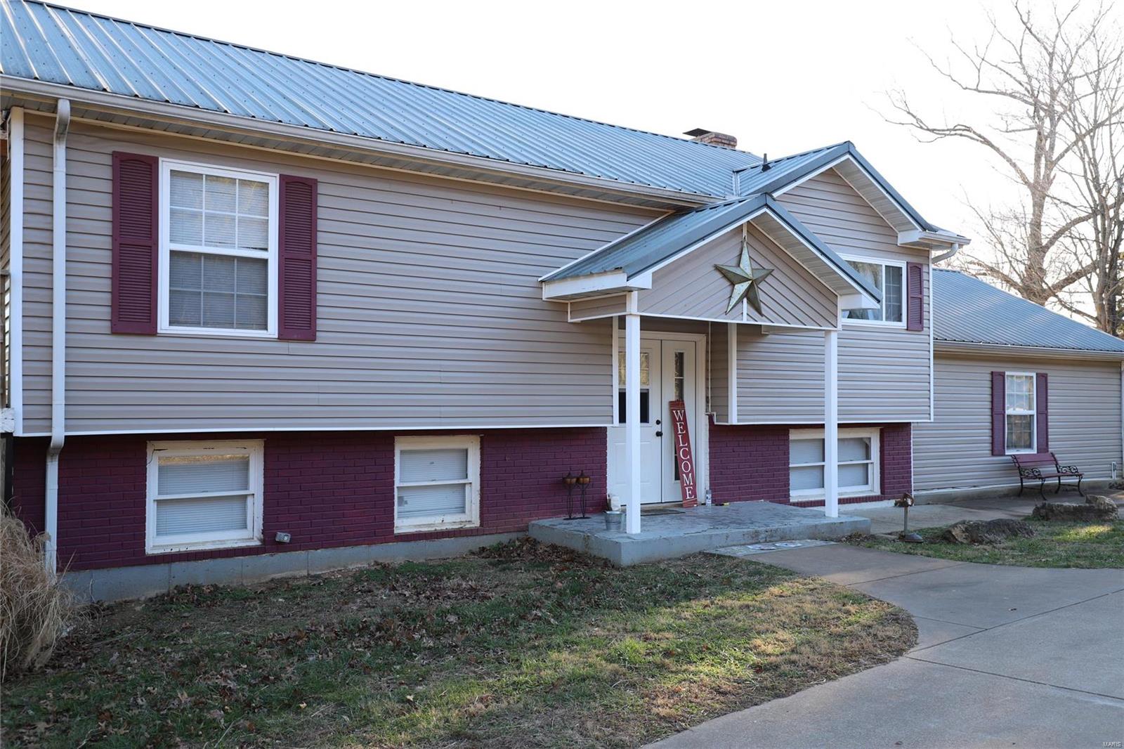 Missouri Forms only!!
All the comforts of country living comes with this charming lake front home! The view is amazing and so relaxing! House sits on 1.58 acrea of land with a new deck that overlooks Cedar Lake. This roomy 5 bedroom/3 bath house is perfect for the family or for weekend family visitors! Watching the sun set across the lake while grilling on the back deck, makes lake life the perfect life! In the wintertime, enjoy a homecooked meal while feeling the warmth of the wood burning fireplace in the dining area! This spacious lot gives you plenty of family privacy from all sides..
Cedar Lake has first right of refusal.
MEASUREMENT DISCLAIMER:All measurements stated herein are approximate. Square feet and land area measurements are based on county records, all other measurements have been performed by non-qualified person and may be inaccurate.