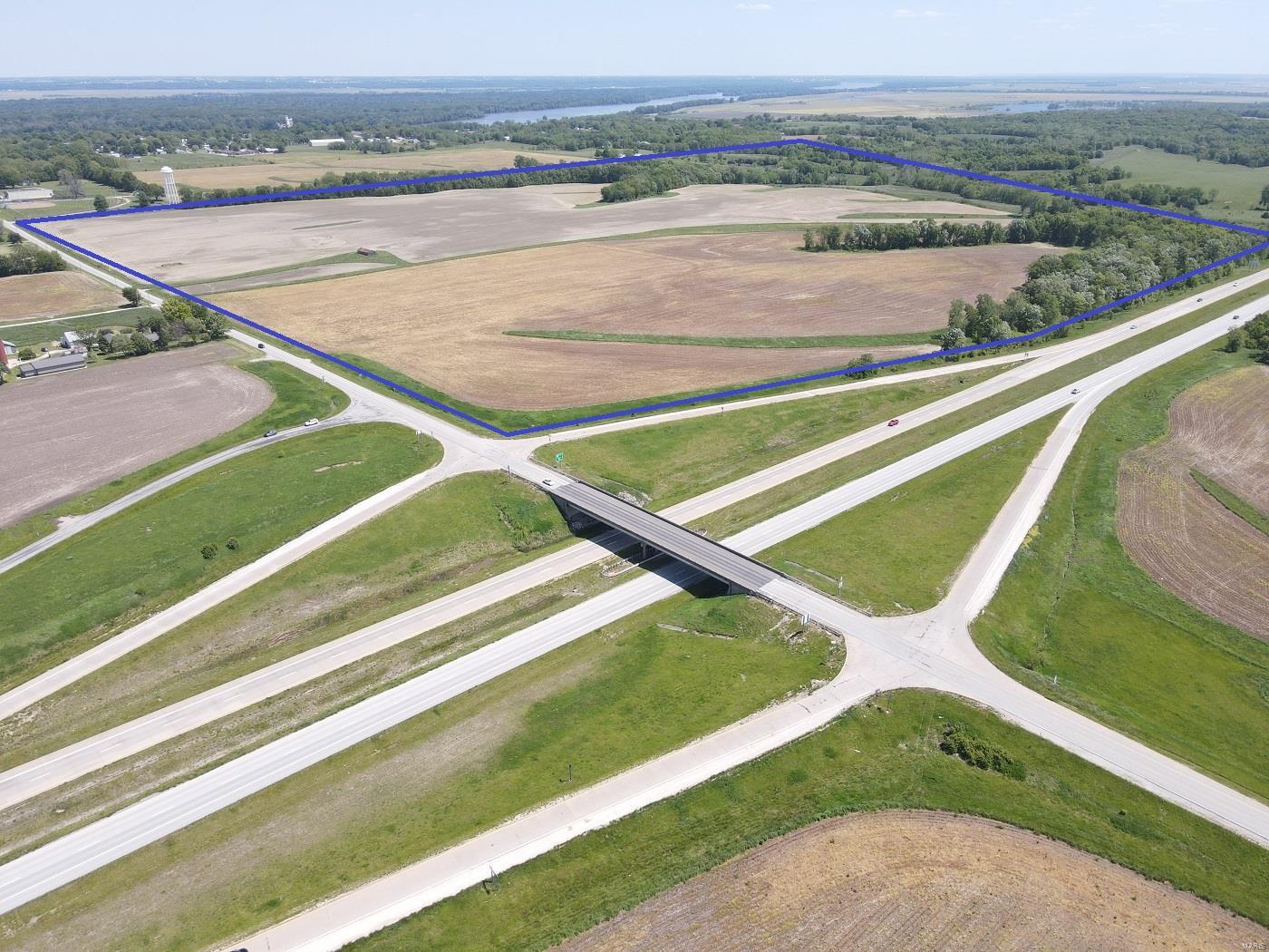 Here's an opportunity - 144 acres m/l ideally located at the junction of US Hwy 61 & State Hwy C in LaGrange, MO.  With approximately 115.59 acres currently in production per FSA, this farm has been in the same family since 1933.  It is currently rented for the 2024 crop year on a 50/50 crop share basis, and has been farmed by the same family for 3 generations.  With direct access (multiple points) off blacktop Hwy C, there is also access off 245th St that runs along the south edge of the property.  There is high-visibility along US Hwy 61, and the farm borders the exit ramp, making this a desirable commercial location with tremendous development potential. With the wooded southern part of this tract there is also the possibility of recreational income, with the farm being surrounded by other crop fields & pasture tracts. Located on the west edge of LaGrange, this is 15 minutes to Quincy, IL or 2 hours north of St. Louis, MO. *There is also 30 acres listed for sale across the highway.*