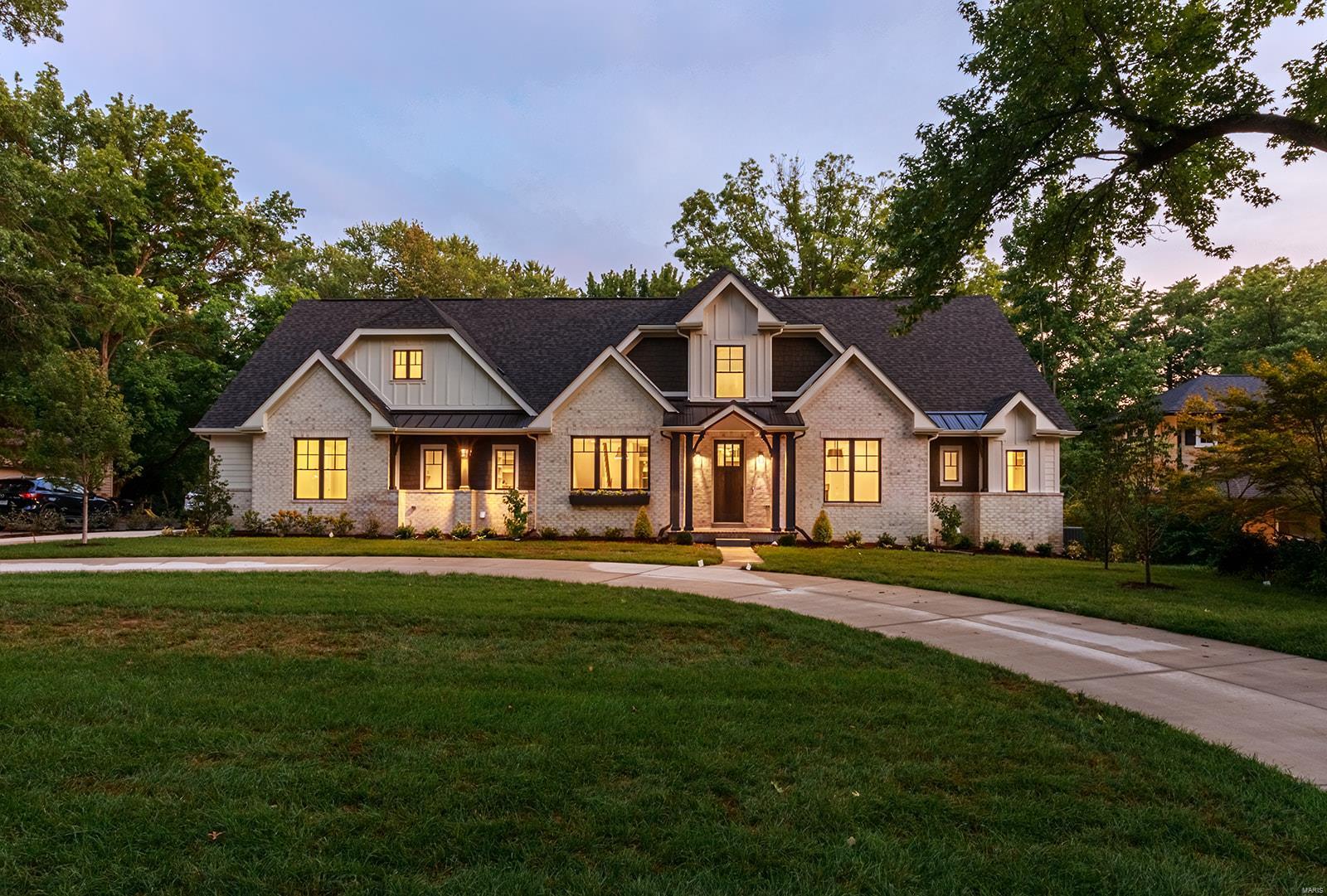 Flower Homes has outdone itself again in the design of this brand new, beautifully livable 1.5 story home nestled on a lovely wooded lot in Ladue. So many features to love & enjoy such as: the vaulted & beamed Gathering Room w/flr to ceiling windows & a soaring brick frplc; the open plan kitchen & dining areas w/custom cabinetry & Thermador appliances; the brick walled foyer leading to a private study; the luxurious vaulted & beamed MBR suite which also has a cosy fireplace. The master bath provides a huge walk-in shower, double vanities, a soaking tub & private his/her closets. Also on the 1st flr is a 2nd bedroom suite (a great feature for guest & in-laws visits). Up on the 2nd flr are 3 more bedrooms, 2 full baths & a large loft/balcony hang out area. The LL has a large finished rec area w/lookout egress windows & another full bathroom. The deep private back yard is perfect for a pool & the rear entry 3 car garage, concrete drive makes for a great play area. Its a cul-de-sac st. Additional Rooms: Mud Room