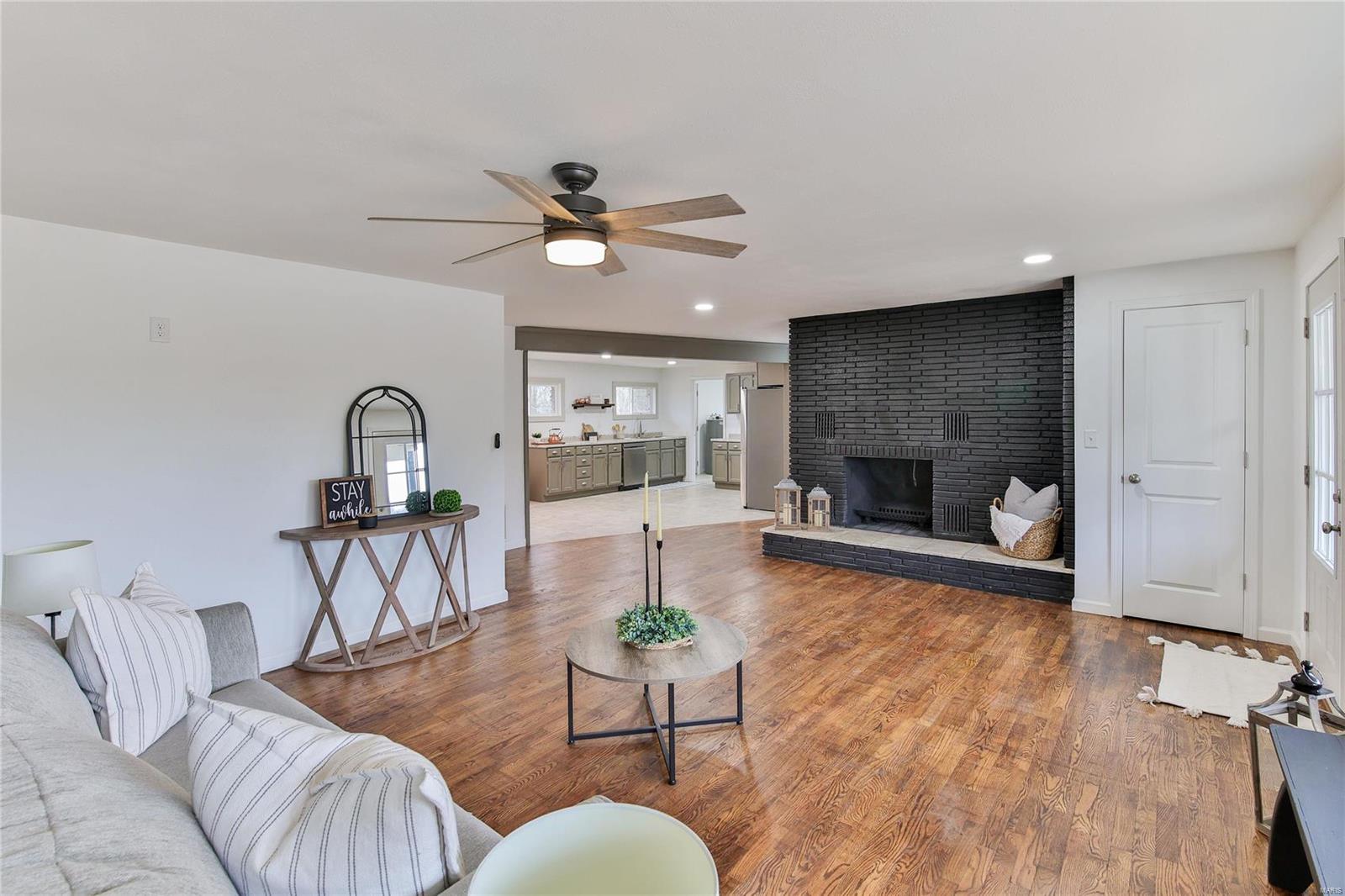 Here is the one you've been waiting for!! This beautiful ranch home is nestled back on 4.7 acres that is unrestricted! You are greeted with hardwoods throughout, and a divided floor plan which is completely open to the kitchen! This home is made for entertaining with 2 other bedrooms, another full bath, & mudroom/ laundry room. The attached garage offers plenty of space for toys and vehicles, not to mention the metal roof you will have for a lifetime!