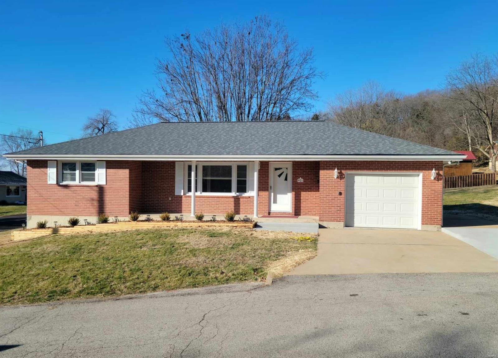 This home has so much to offer you will want to put this beauty on your schedule to see this weekend! Light flows through this sound home all day. Look at the gorgeous real wood floors in the spacious living room. There are 2 very nice sized bedrooms that also have these like new looking wood floors. The hall bath offers a walk in shower and plenty of room. Hallway has 2 linen closets so storage isn't an issue. This newly styled kitchen has great cabinets, newer stainless appliances with access to the deck for entertaining or grilling. You can even enjoy your coffee and watch the abundant deer feeding in the wide open yards. This house has in town conveniences with the spacious out of town feel. If a little more space is what you are needing you can double your living space by finishing off the basement. There is already a little bit of framing in place as well as a half bath! Enjoy your life in this virtually maintenance free brick home with a brand new roof.