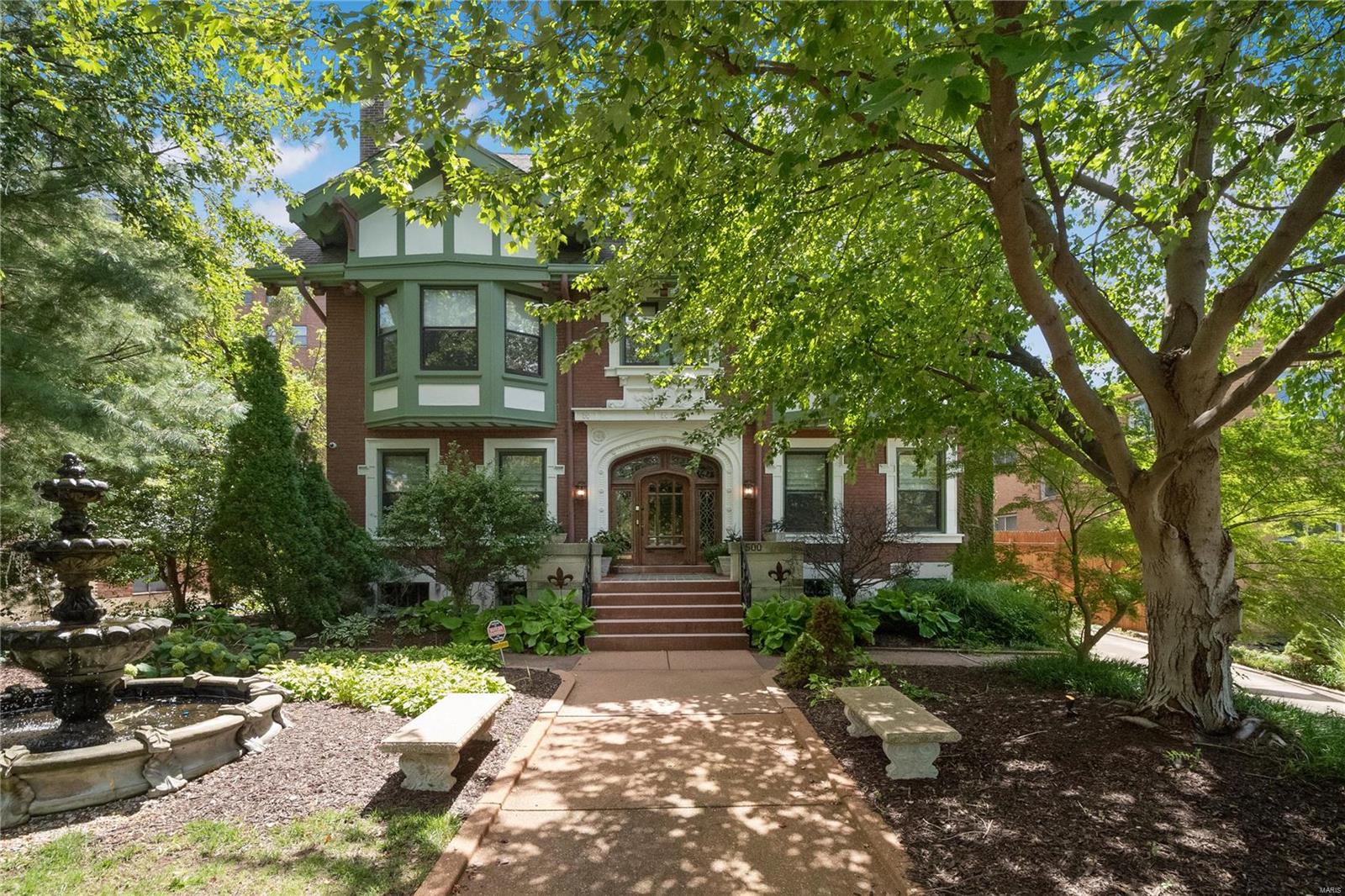 Beautifully situated on one of the largest private lots in the city, facing the Compton Hill Reservoir. This 3 story stunner allows for all of the seclusion needed while having the best of STL at your fingertips. The main level features hardwood flooring restored to its original glory, custom crown molding and two stately functional fire places that greet you upon entrance. Original pocket doors have been beautifully preserved in nearly every room. 6 of the total 8 bedrooms are primary suites with updated and oversized en-suite bathrooms. Massive 2nd floor laundry with additional mud room for easy cleaning. Not only will you be amazed by the one of a kind crafted staircase leading you to the 3rd floor but also the fully rehabbed 3 bedrooms, 2 baths and eat in Kitchen that awaits you. Making the perfect potential air-bnb or owner occupant apartment. With all newer systems, new windows throughout and endless upgrades this home has endless possibilities.