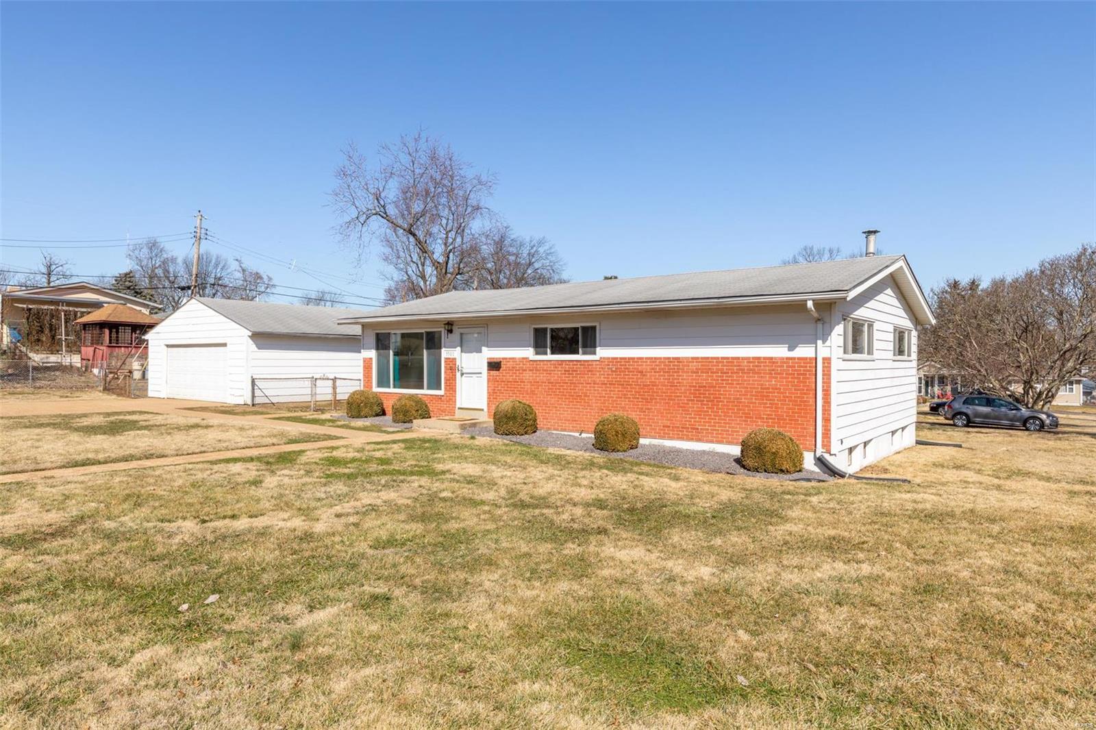 Looking for the quiet life, yet need to be close to Hwy 55, 44, or 270?  This 3 Bed/1 Bath Ranch (detached 2-car garage on corner lot) may be it! Enter into 1,000+ sq ft of main floor living. Turn-key with NEWLY refinished hardwood floors, freshly painted walls throughout and an abundance of natural light (updated windows). Kitchen includes NEW vinyl flooring, ample storage, solid-surface counters, gas stove/range, and NEW dishwasher. Formal dining area off kitchen. Updated full bath includes NEW vinyl flooring and vanity. Bedrooms boast hardwood floors w/plentiful sunlight and closet space. More storage space in full-sized basement - finish out to your liking! (Set up for electric hot water heater – currently gas, has rough-in.) Oversized garage includes workshop area (220 amp installed) and side access door. Partial chain-link fence around patio area – great for grilling, entertaining, or gardening. Off-street parking +4. Home Warranty included for peace of mind! Affton Schools.
