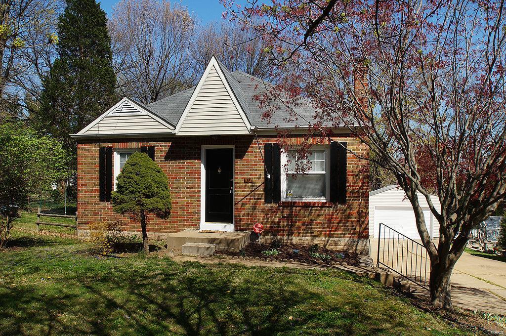 FIRST SHOW, Saturday, April 9 at noon. This well cared for 2 bedroom,  2 baths, 3 car garage,  house with over 1600 sq feet of living space on the main floor is located on quiet dead end street. Great Mostly brick, covered porch leads to Living & Dining Rooms with cove ceilings & hardwood flooring. Kitchen offers white cabinets with brushed nickel hardware, include pot rack, Frig is optional, just enough room for small breakfast table. HUGE Family room 26 X 24 gives you loads of living space and has french doors to 16 X 16 deck overlooking large level, completely fenced backyard. Both Bedrooms have hardwood flooring & ceiling fans.  Main Bath has updated vanity, ceramic tile floor. Lower level has second full bath, partial finish, wet sink & storage shelves. Attached oversized 2 car garage AND detached oversized 1 car garage!! Also newer windows. Sellers are flexible with closing date.