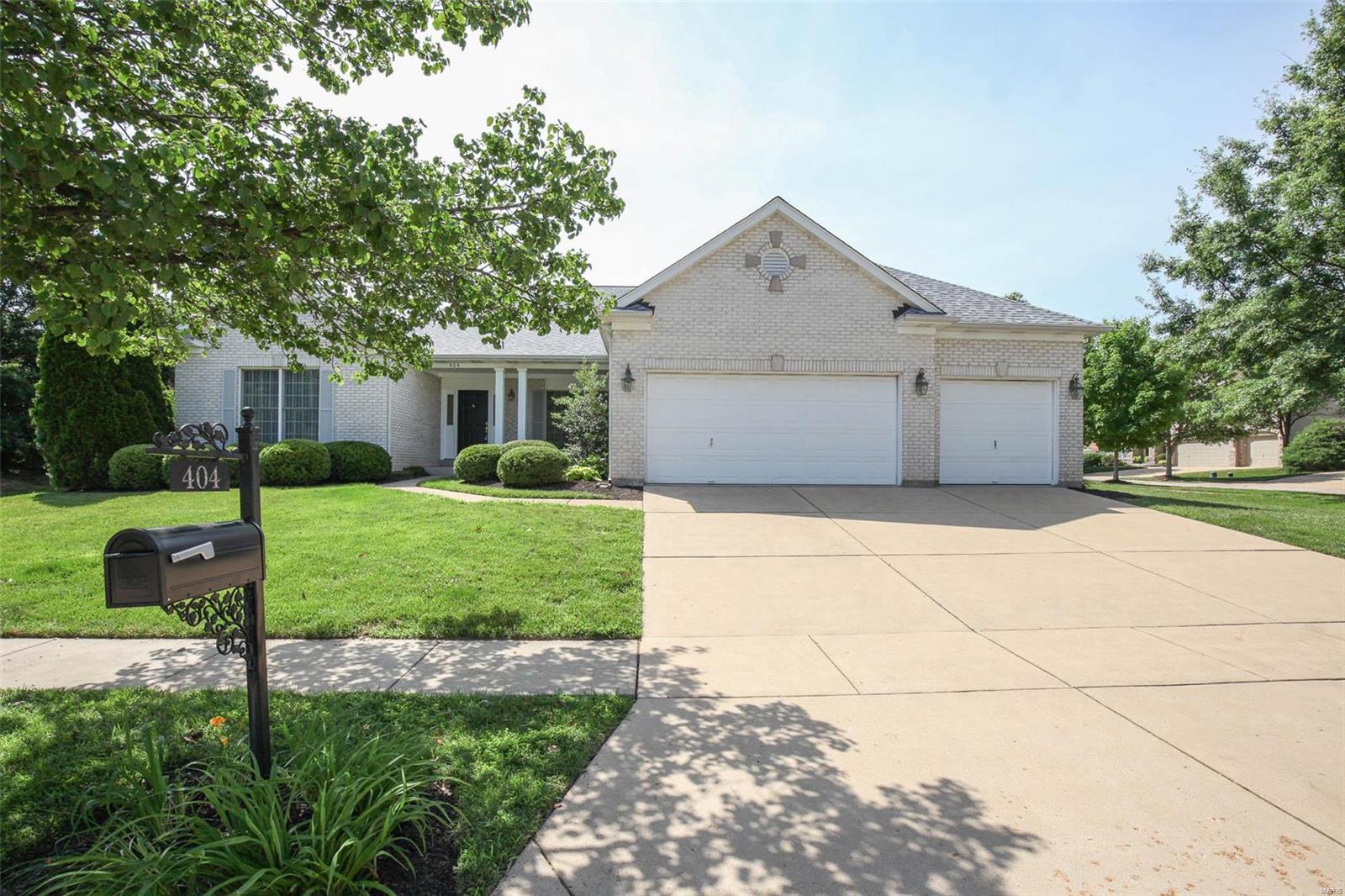 Welcome to this wonderful Ranch w/ brick front & a 3 car garage on a level fenced lot in a great location w/ easy access to shopping, restaurants, Faust Park & highways. Enter from the 18 by 6 covered porch into this Great Room Ranch foyer w/ hardwood floors. You have an office / living room to the left & dining room to the right. The great room has cathedral ceilings, a three brick raised hearth wood burning fireplace. Plenty of room and counter space in the kitchen & breakfast areas with 42-inch cabinets. There is a slider that leads to the 24 x 12 patio off the back. This is a split bedroom floor plan, so the master is on one side and the auxiliary bedrooms are on the other side of the house. The mastersuite has 9-foot ceilings, a 13 x 6 walk in closet, dual sinks and a corner jetted soaking tub. The laundry room also has a utility sink. The lower level has a rough-in for a full bath. Inground Sprinkler and enclosed soffit & fascia too. Additional Rooms: Mud Room