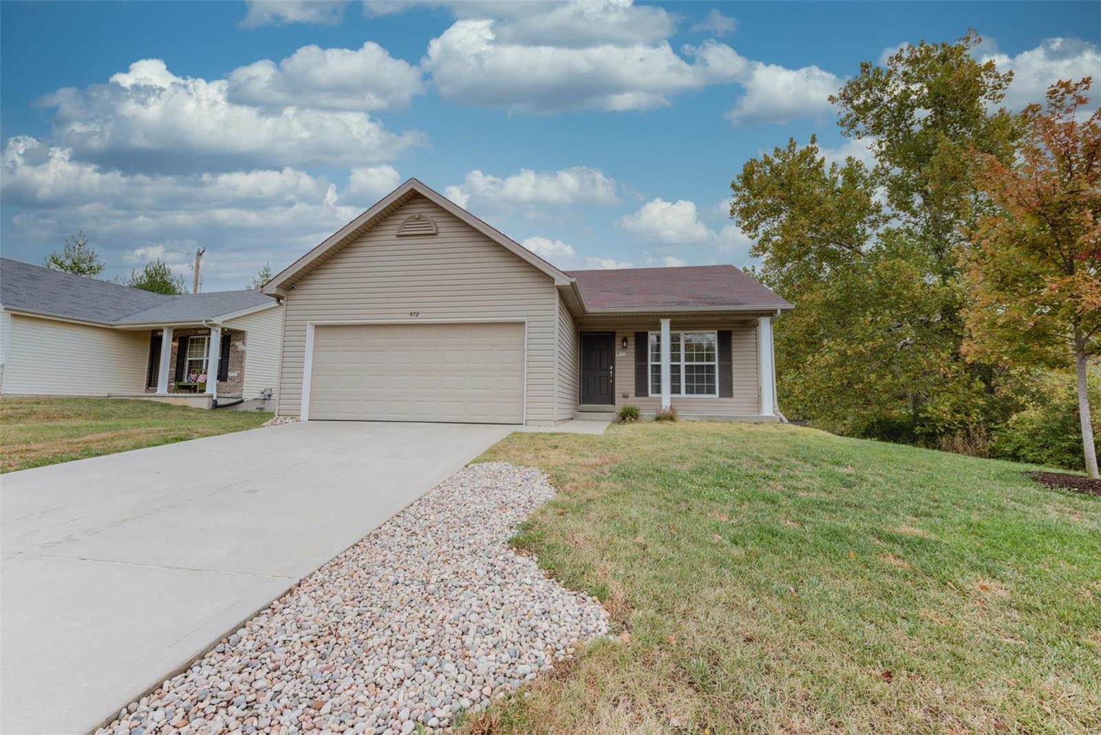 Welcome home to Fall Rivers Estates! This 3 BDRM/3BTH boasts 1800 sq. ft. of total living area. Pride of ownership is evident in this 8 year old home which features an open concept with an abundance of natural light, vaulted ceilings and beautiful hardwood flooring.  The open staircase leads you to the fully finished lower level that will accompany all of your guests and has dimmable LED can lights that can be controlled by your smartphone. This recreation area is the perfect space for a workout area, family game nights and all your entertainment needs! Relax after a long day in your 8 jet, 2 person 36" jacuzzi tub with heater. Plenty of room for storage with mobile shelving and even a play area under the stairs perfect for an indoor playhouse. So many upgrades you wont want to miss including Wi-Fi Reverse Osmosis for purified drinking water & line to the refrigerator, water softener and humidifier. WOW! Your new home even sits on over 1/3 of an acre with plenty of room for a pool!