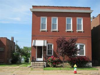 Opportunity knocks! This two family building has a lot to offer. Both units have updated kitchens and baths, plumbing, and electric. The first floor has hardwood floors through out and the second floor has carpet and ceramic tile. Newer windows and recently resurfaced roof. Each unit has it's own 12'x11' deck. The second floor deck has great city views. All this is topped off with a rare front entry drive that leads to a fantastic 4 car garage. The garage has over head doors for easy access. You need to see this one for yourself.