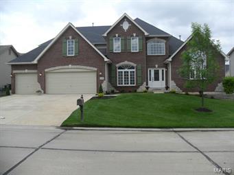 Absolutely gorgeous, designer 1.5 story, 4 bdrms, loaded with lots of amenities & upgrades.Oversize 3 c/gar Soaring 11’&9’ ceilings. Leaded Doors Welcome to this spacious foyer & grand dining room.Beautiful gleaming w/floors are present in this spacious&open floor plan Staircase features wrought iron baluster.Expansive Great Rm with stunning gas f/place accented with custom built shelving.Cooking at its best any chef's dream kitchen granite counter tops, bkfst bar, butterfly ctr/ island, upgraded 42 in staggered cabinets, crown molding & dbl ovens.Lots of crown&custom trim accents.Spacious bkfst rm & cozy hearth rm with fire/pl.Luxury Main floor m/suite, sitting rm coffered ceilings adult/ht vanity,OS garden jetted tub & sit down ceramic shower. His & er w/in closets.Upstairs 3 spacious bdrms, jack & Jill bath &bonus rm & another full bath.Beautiful Finished L/L,bed/rm bath,Rec rms. Sub/div pool upgraded lighting & carpet. Dual hvac in/grd sprinklers patio Great location close to Hwys