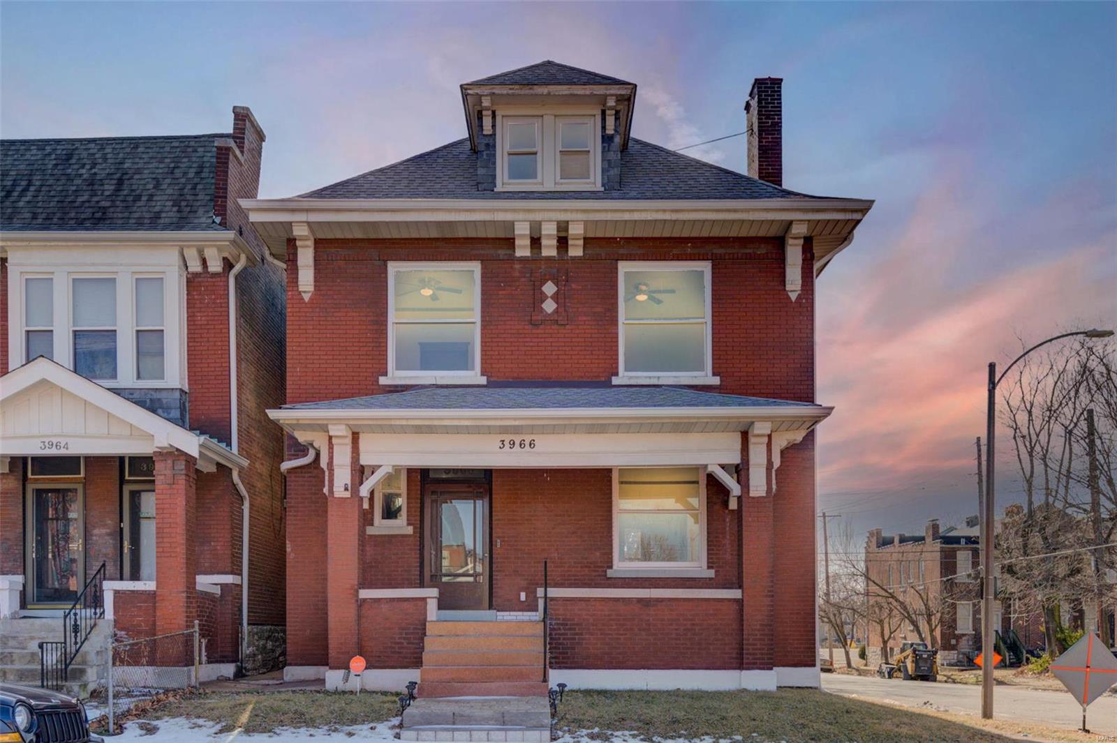 Sitting on a corner lot, a stone’s throw from Fairground Park, this grand two-story has been carefully rehabbed and is ready to be your next home-sweet-home. Sky high ceilings, exposed brick, and gorgeous millwork welcome you as soon as you step into the foyer. There’s plenty of open entertaining space with the living room flowing into formal dining room, or close the pocket door for divided spaces. The kitchen features new appliances and low maintenance flooring. Upstairs you’ll find four spacious bedrooms, all with high ceilings, large windows, and ceiling fans. Off the first bedroom is a brand-new deck, perfect for morning coffee. The hall full bathroom is fully updated with a stunning clawfoot tub and tile flooring. Head up another set of stairs for even more living space in the roomy attic bonus room. Convenient off-street parking in rebuilt one-car garage. Updates include new roof, plumbing, electric, and more, while retaining the charm of this historic building.