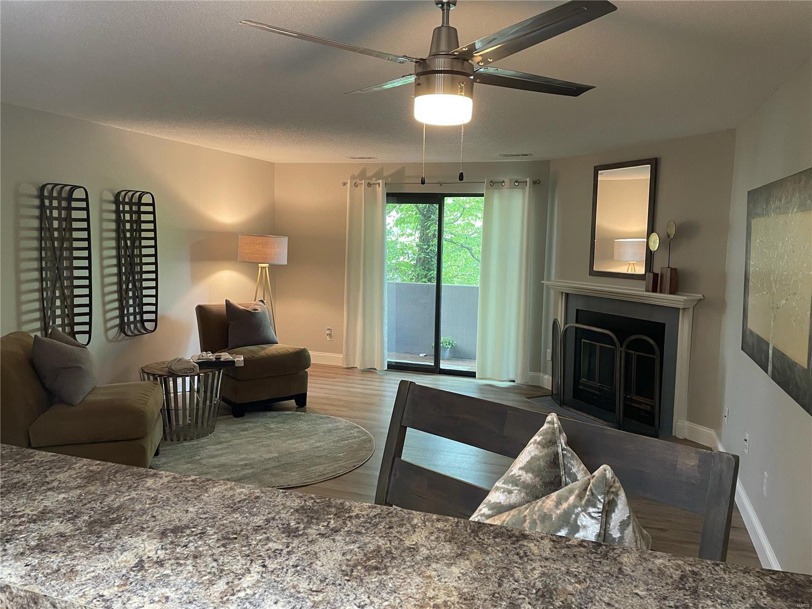 Welcome to this adorable condo located in a great location.  Attractive wood-look laminate throughout, tasteful cabinets & stylish light fixtures. This unit was freshly painted & clean as a whistle!  Enjoy your morning coffee on the spacious balcony overlooking the community pool. All appliances including the washer/dryer remain, the A/C unit is brand new & comes with a 10 year transferrable warranty. One-level living & only one half-flight of stairs to get to the unit. There is a spacious storage area for bike storage or your extra boxes. Public tennis courts & an abundance of shops & restaurants nearby. Welcome home! Location: City